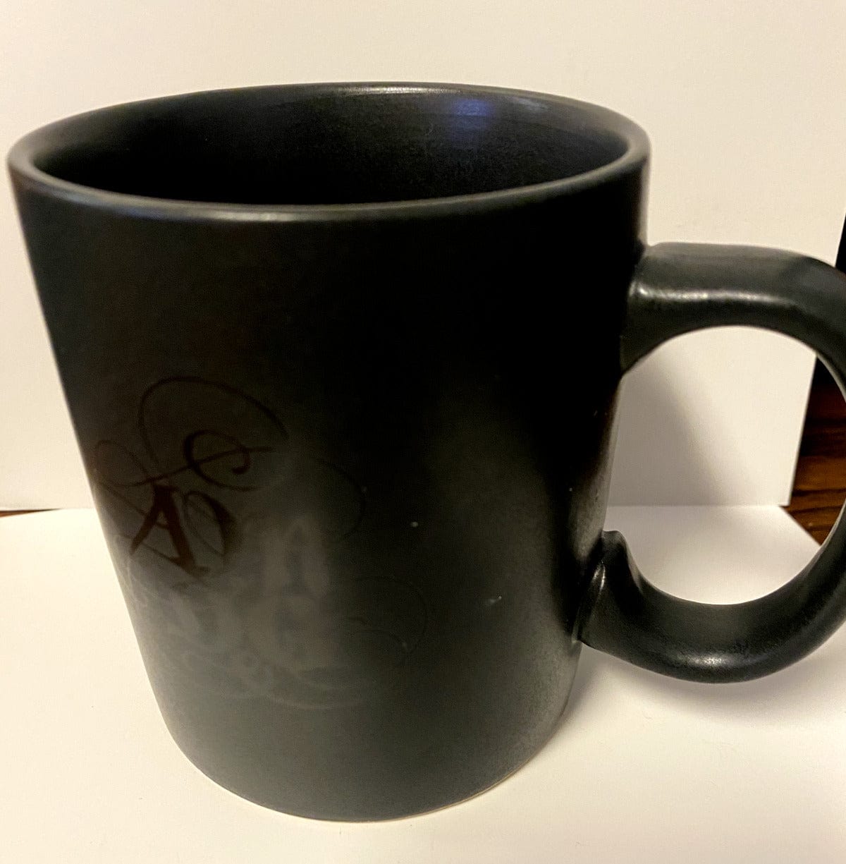 Dark gray 14 oz. ceramic mug featuring "For the Great Glory" Christian message, from AMDG collectibles by Bob and Penny Lord.
