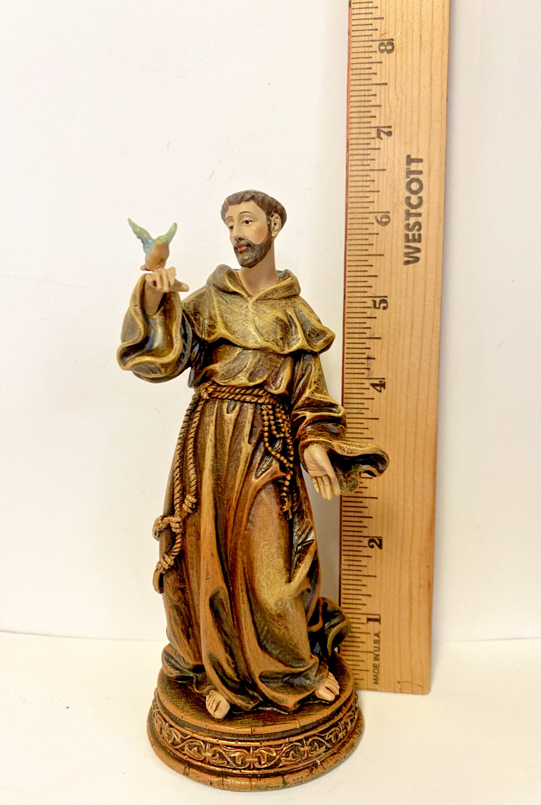 Small Saint Francis of Assisi statue, 6.25 inches, Christian collectible by Bob and Penny Lord, depicting Saint with animals and serene expression.