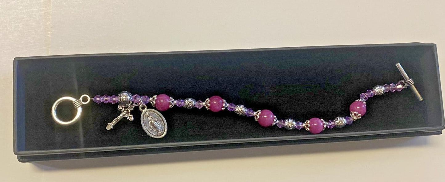 Miraculous Medal Amethyst Madonna del Parto bracelet featuring a religious charm, crafted by Bob and Penny Lord Journeys of Faith.