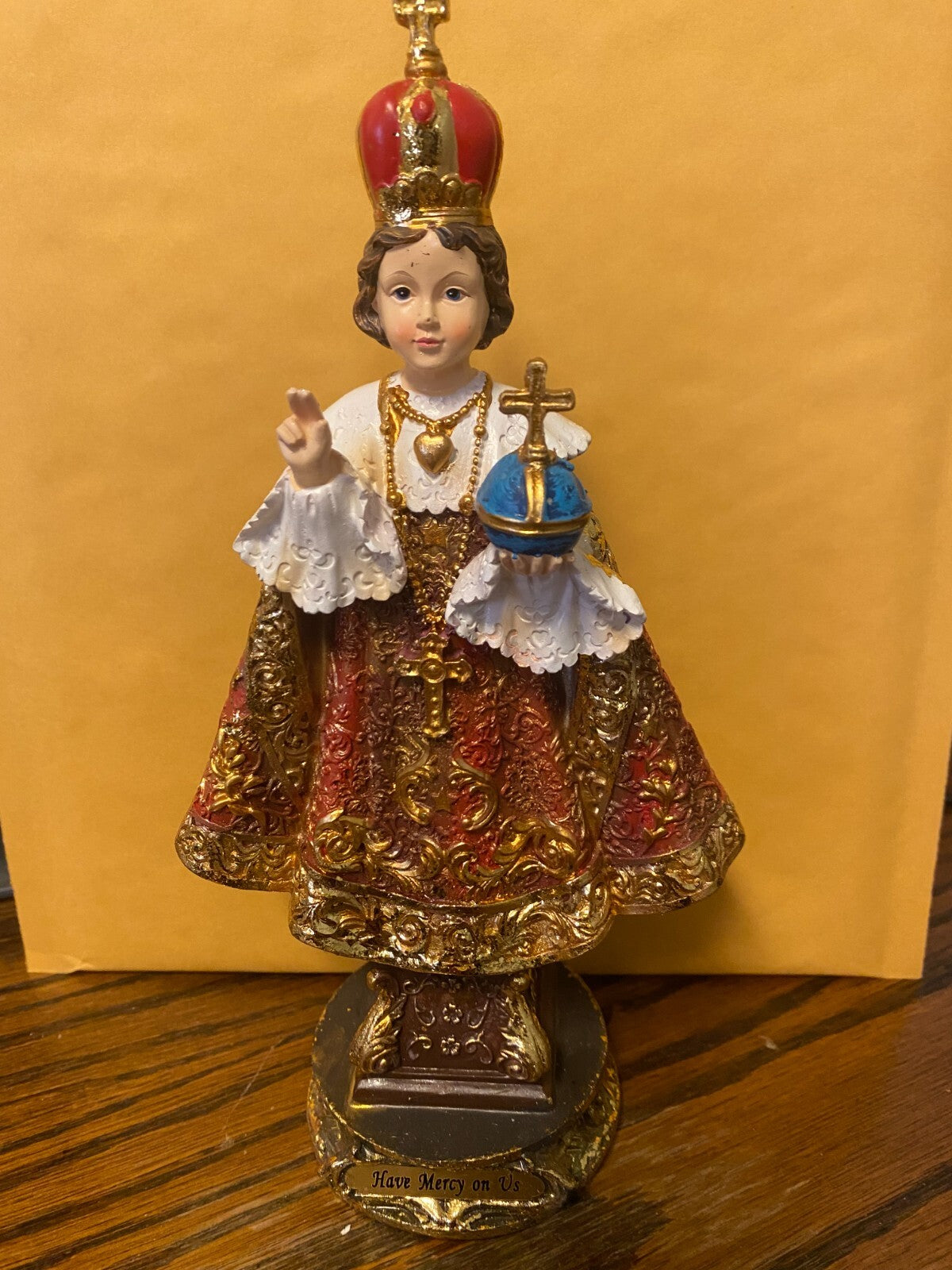 Infant Jesus of Prague 8.75-inch religious statue by Bob and Penny Lord, detailed Christian collectible figure on a display base.