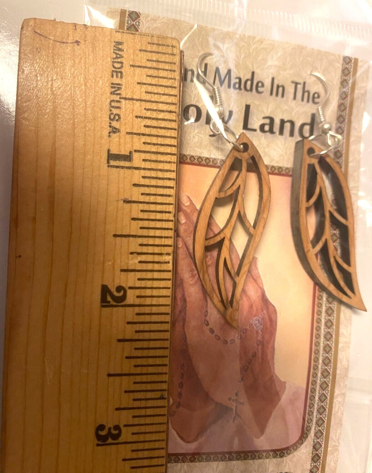 Olive wood hanging earrings, 2.25-inch length, handcrafted fashion jewelry with natural wood finish, designed for stylish wear.