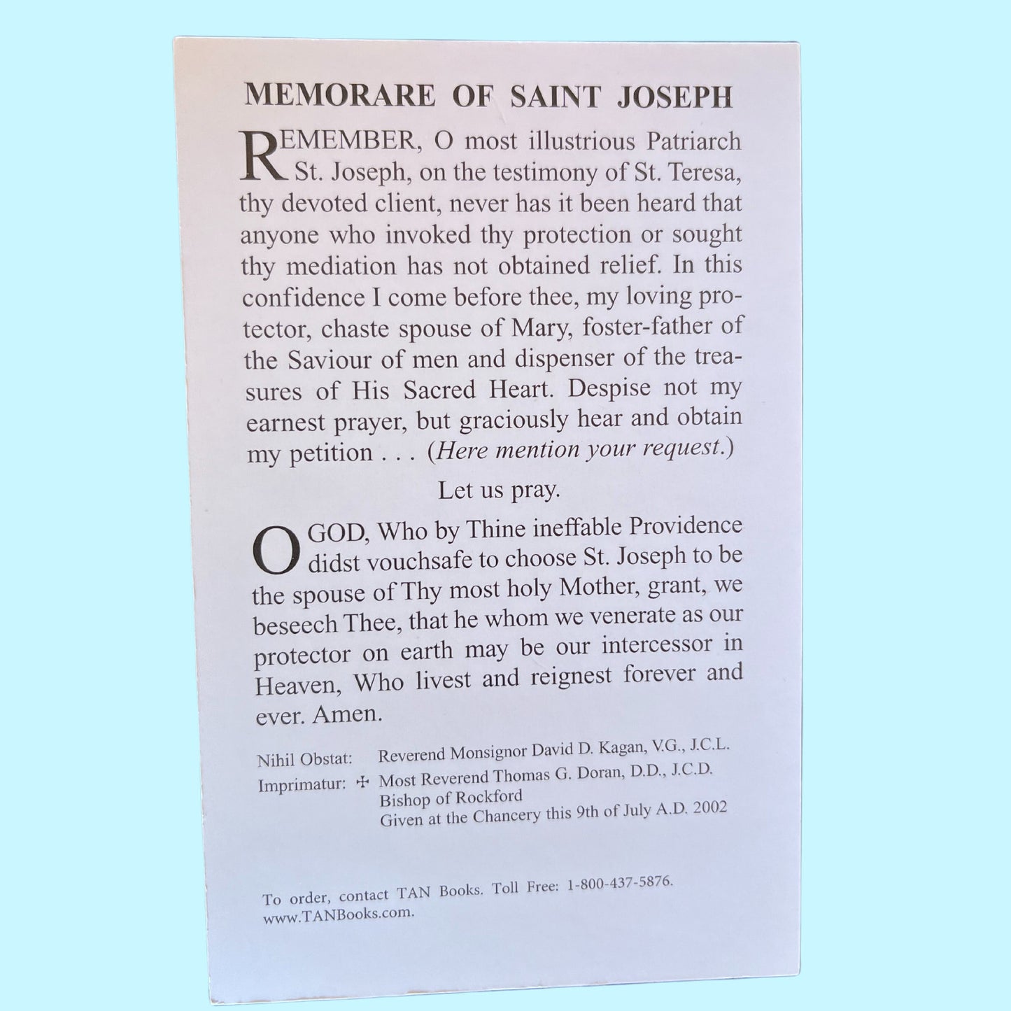 Christian prayer card featuring Memorare to Saint Joseph by Bob and Penny Lord, with religious imagery and spiritual design.