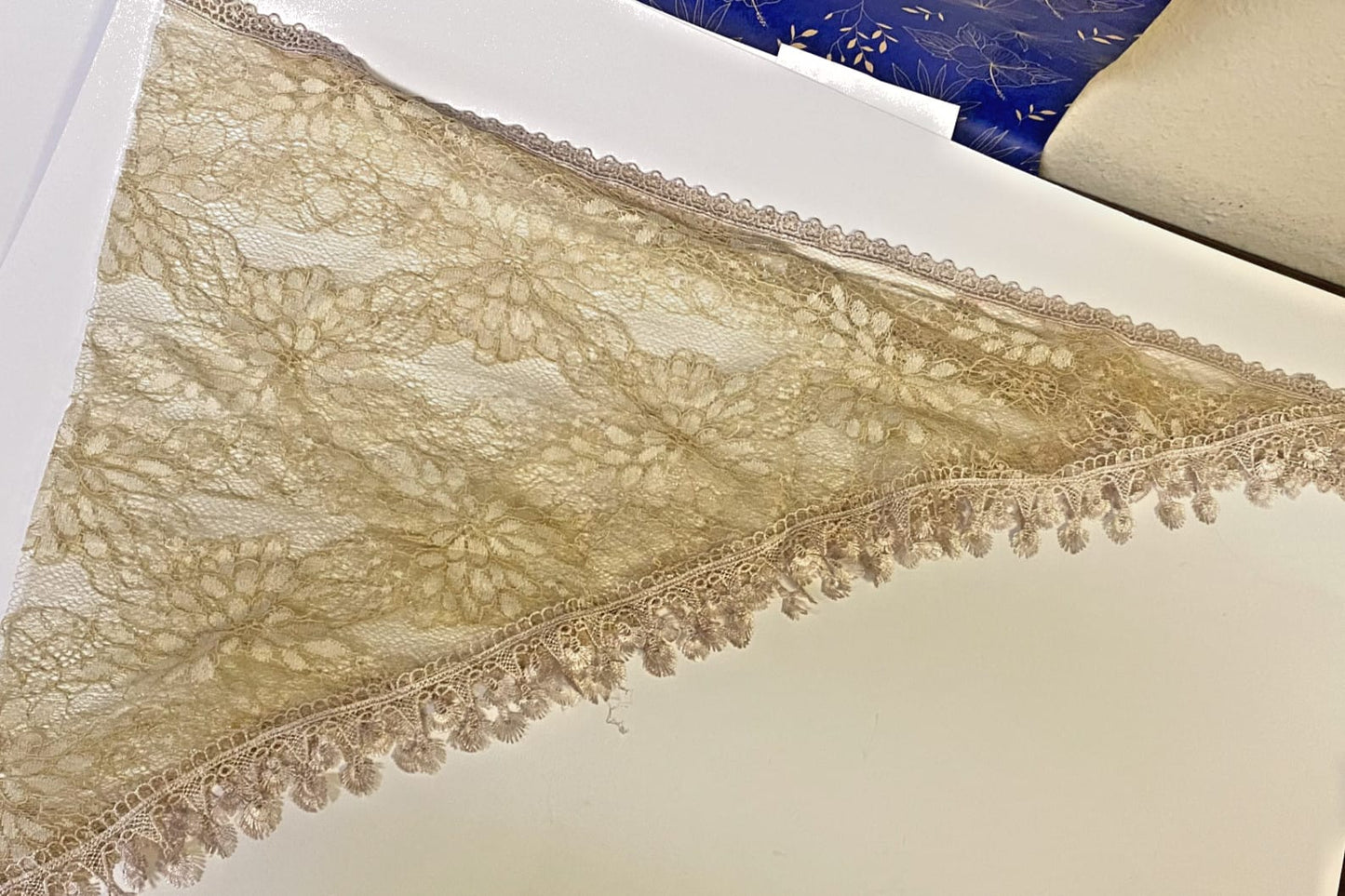 Light khaki lace church veil for women, delicate and sheer, featuring intricate lace details, perfect as a stylish accessory.