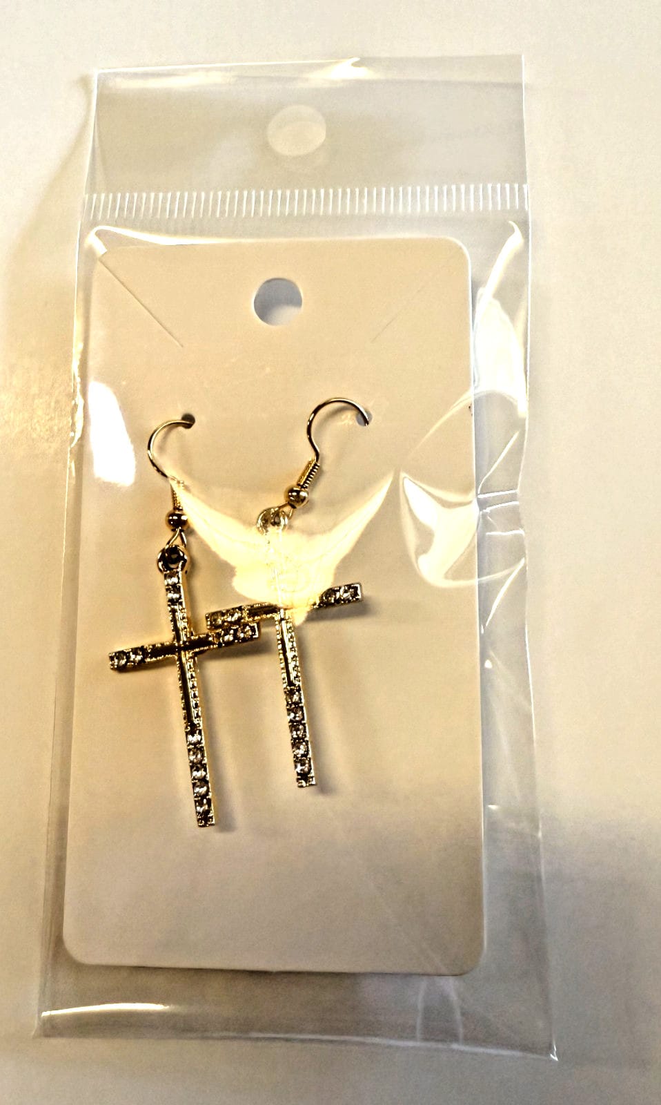 Gold 2.90-inch dangle cross zirconia earrings with sparkling stones, stylish fashion jewelry, unbranded earring design.