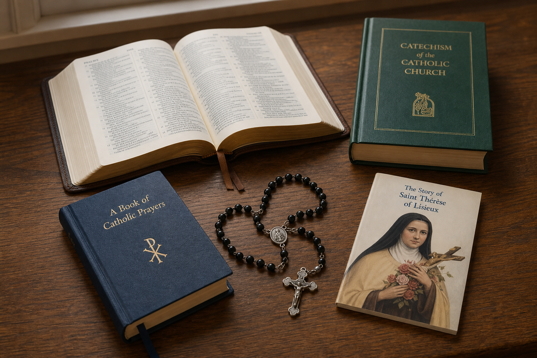Open Bible, prayer book, rosary, and Catholic books on a wooden table