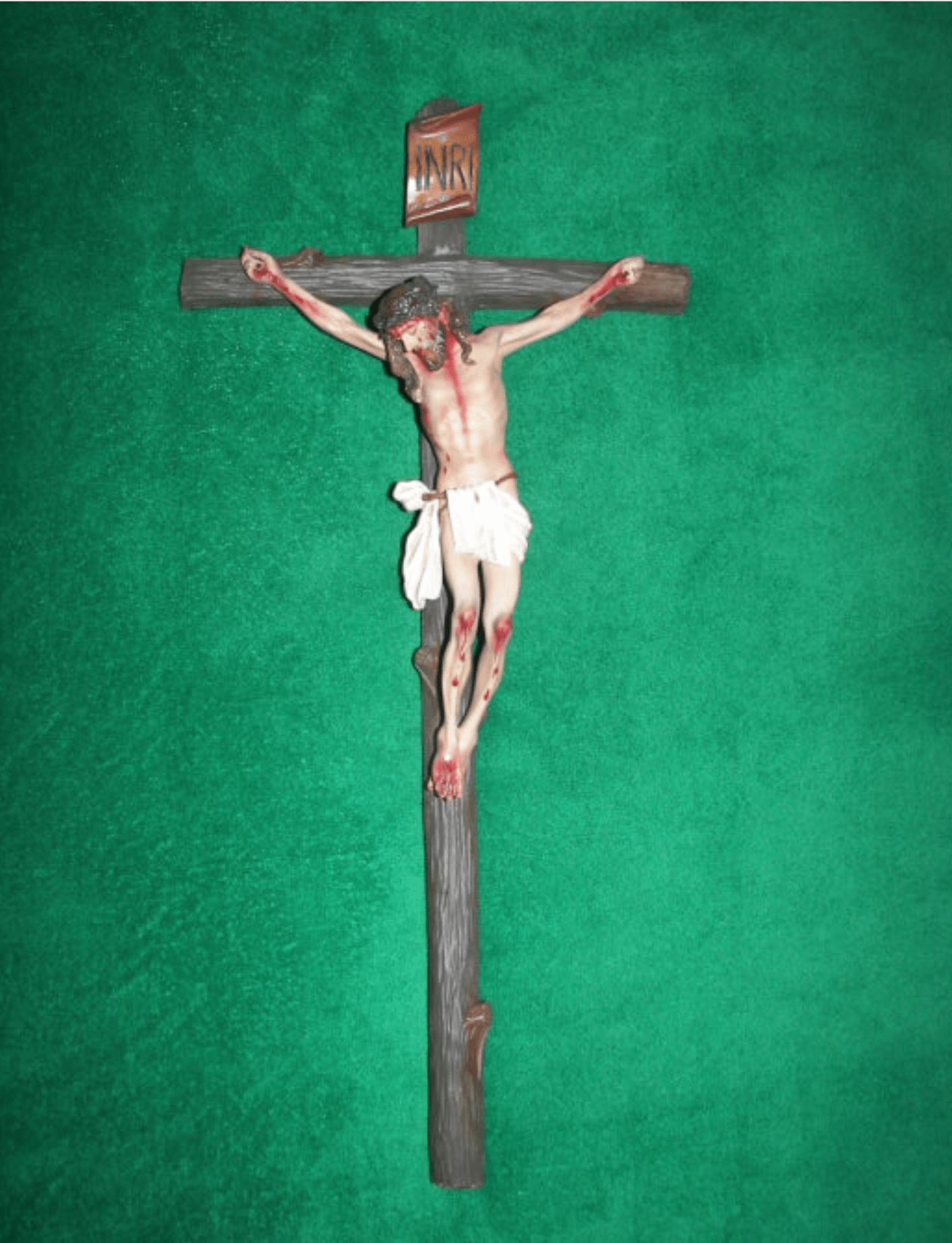 Handmade 24-inch crucifix crafted in Colombia by Bob and Penny Lord, featuring detailed wood carving and religious design.