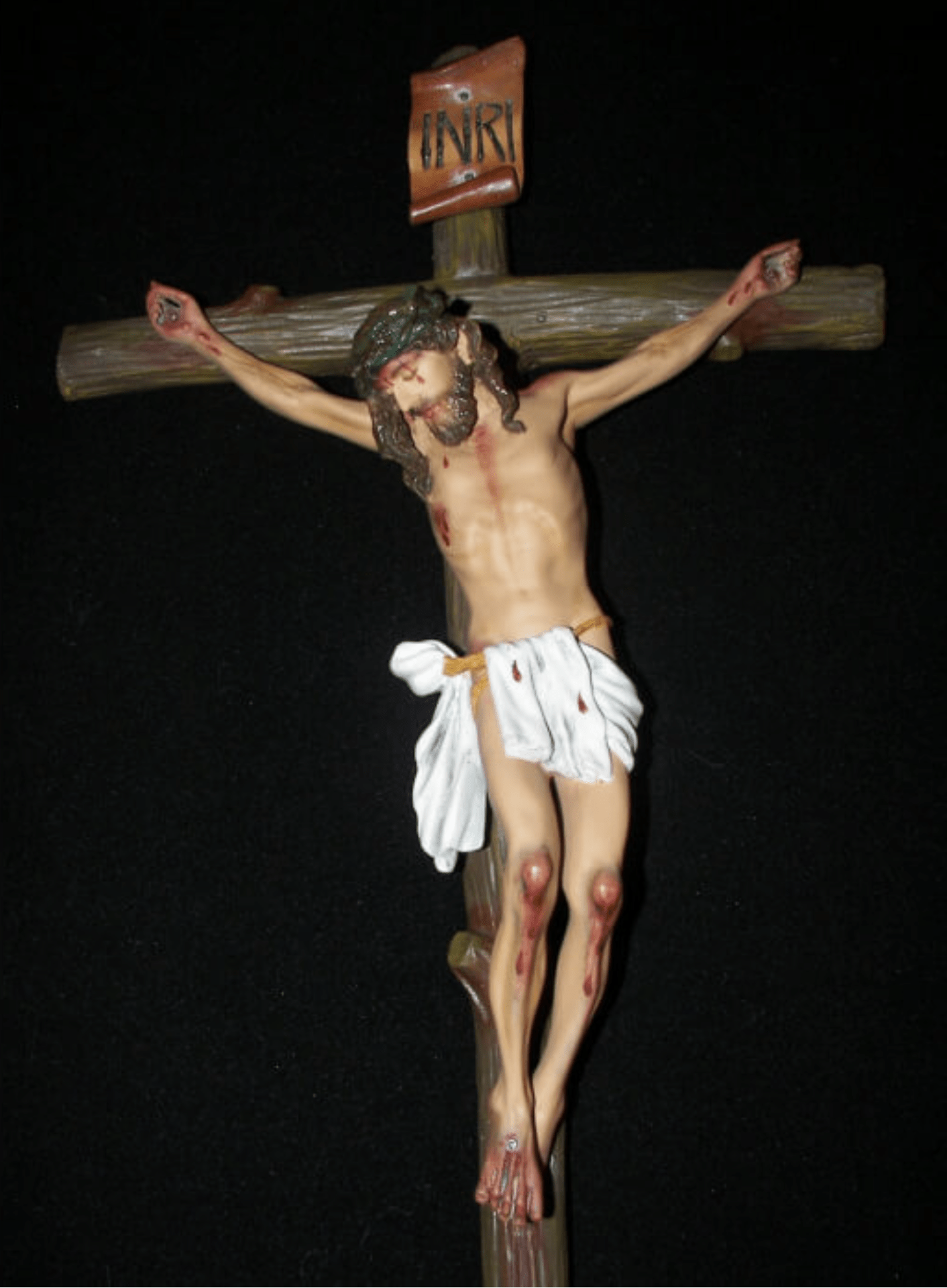 Handmade 24-inch crucifix by Bob and Penny Lord, crafted in Colombia, featuring detailed woodwork and religious design.