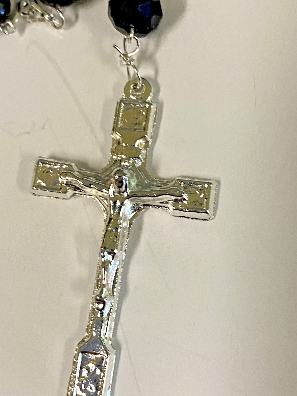 Black handmade Blessed Mother rosary by Bob and Penny Lord, featuring detailed religious beads from Colombia.
