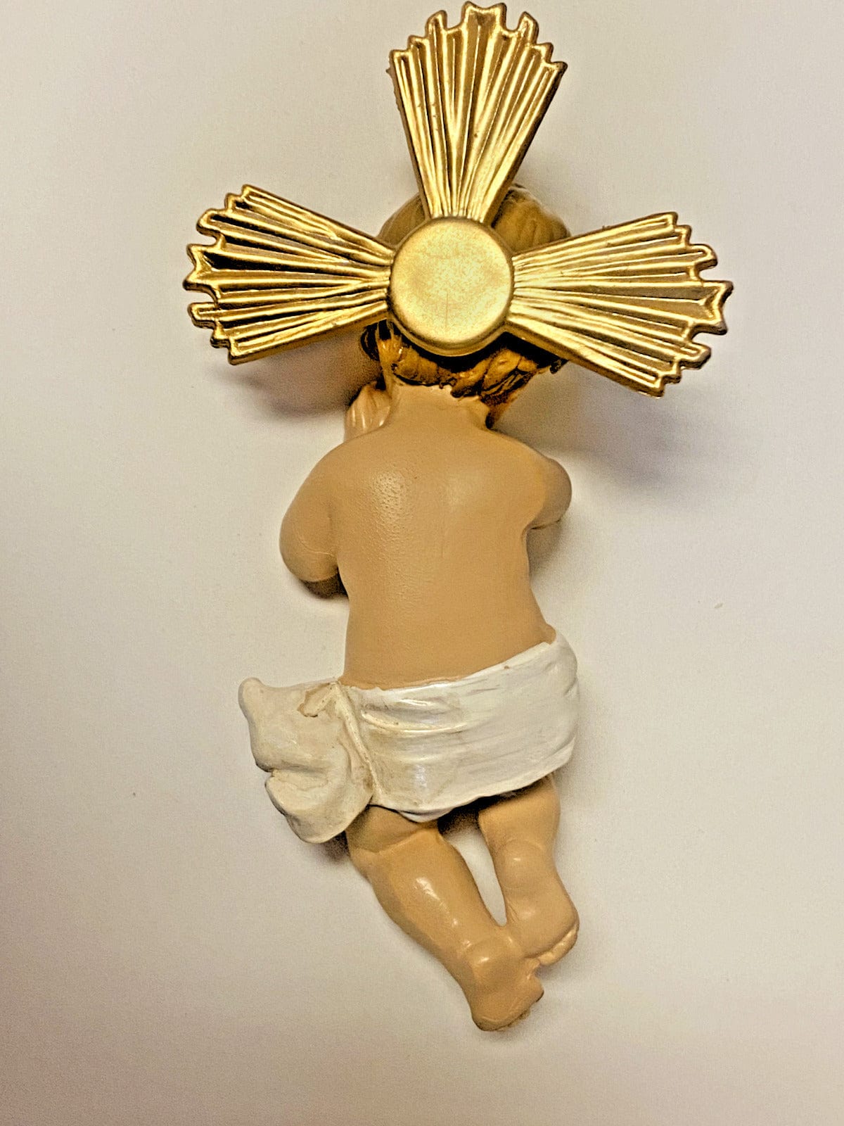 Baby Jesus in a 5-inch manger statue by Bob and Penny Lord, detailed Christian religious collectible figure.