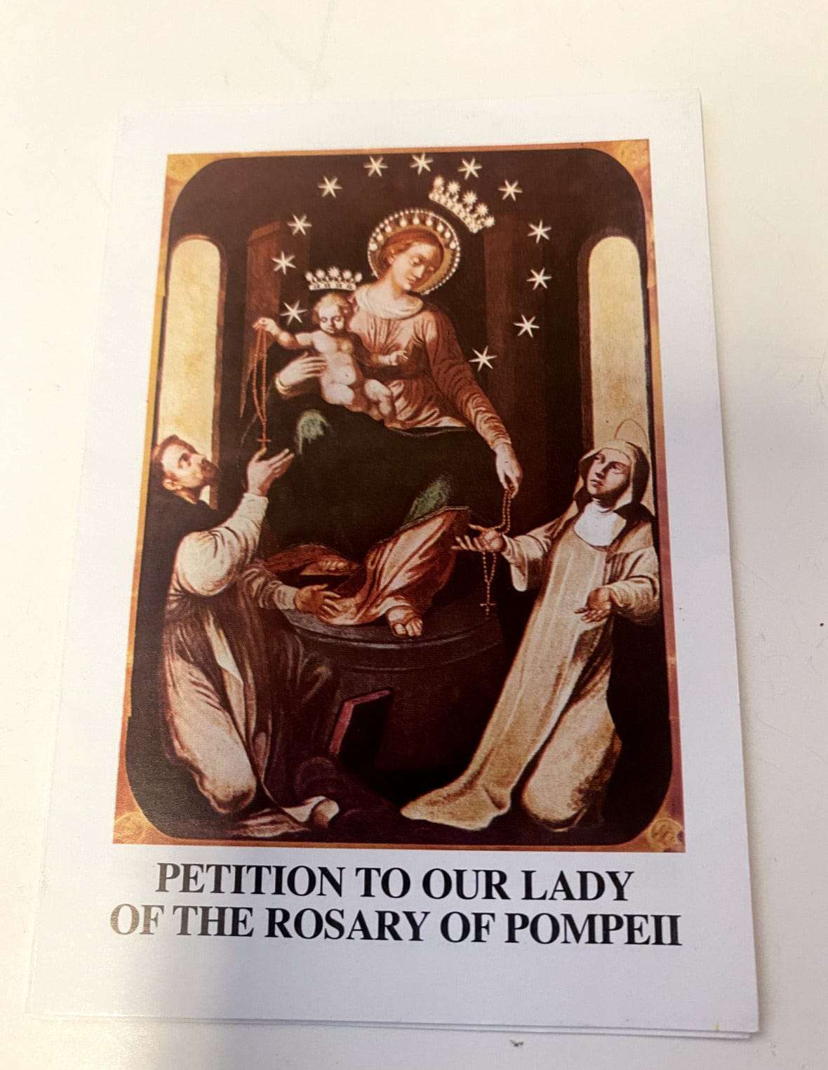 Tri-fold prayer card featuring Our Lady of the Rosary of Pompei, a Christian Holy Card by Bob and Penny Lord, from Italy.