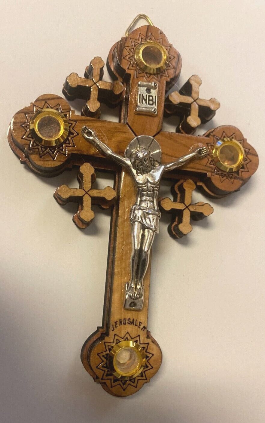 Olive wood and mother of pearl Christian crucifix, 4.75 inches, handcrafted religious cross from Bethlehem by Bob and Penny Lord.