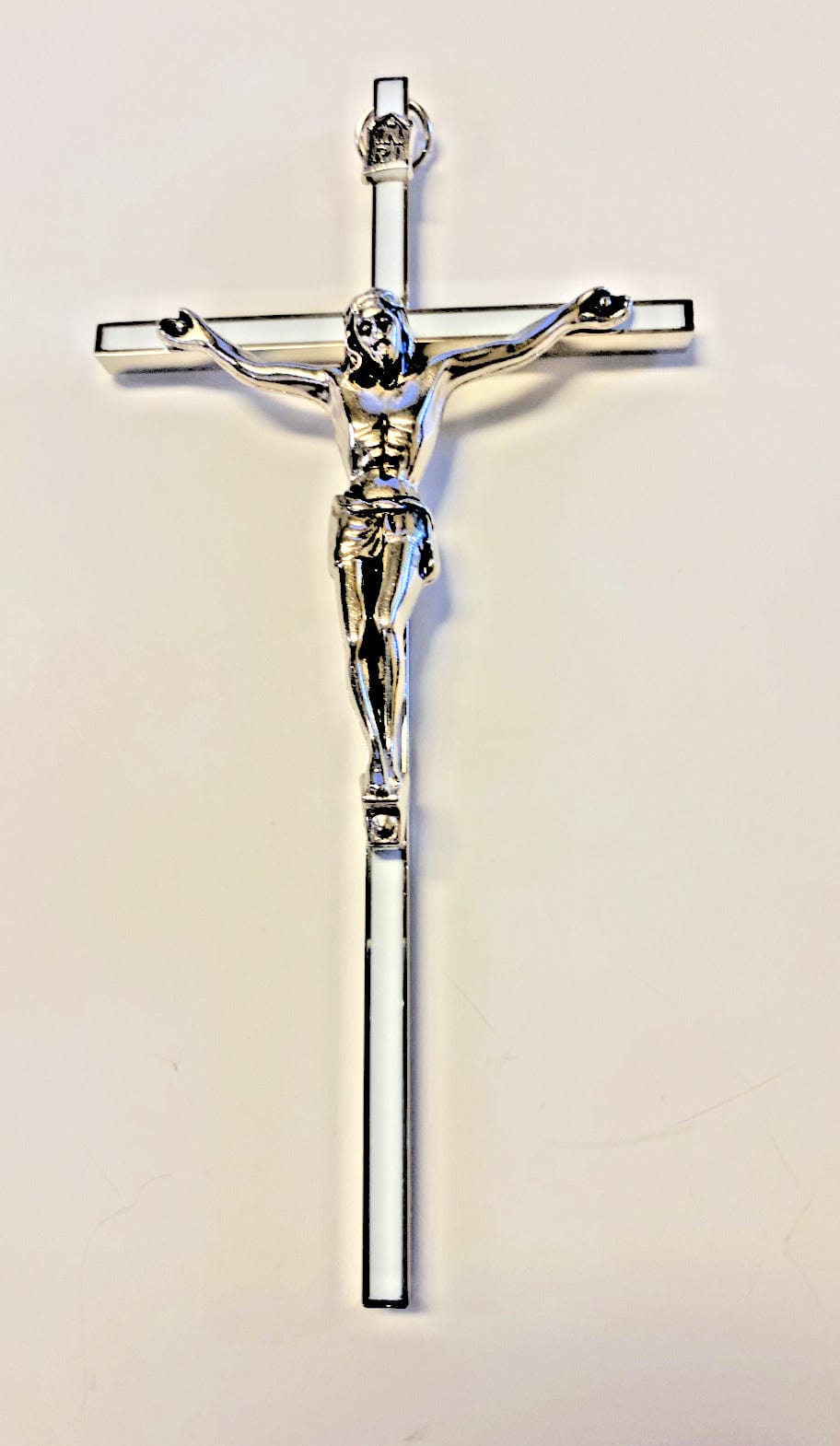 Small silver and white 6-inch crucifix from Bob and Penny Lord, Christian religious collectible with detailed design.