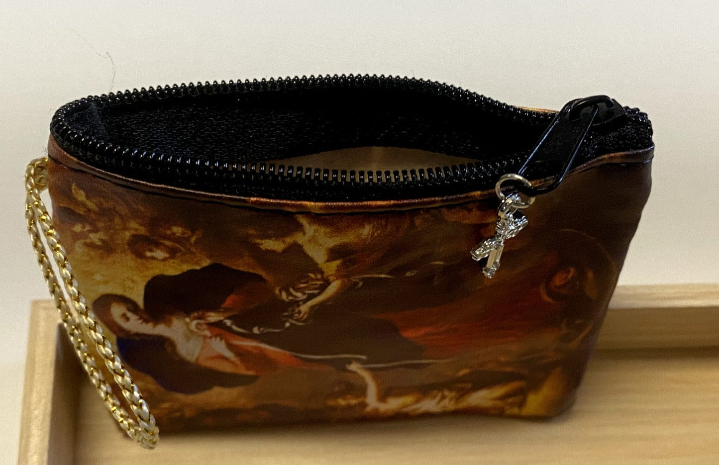 Small Our Lady Undoer of Knots rosary in a 3.25-inch pouch, designed for women, with a focus on religious accessories and handbags.