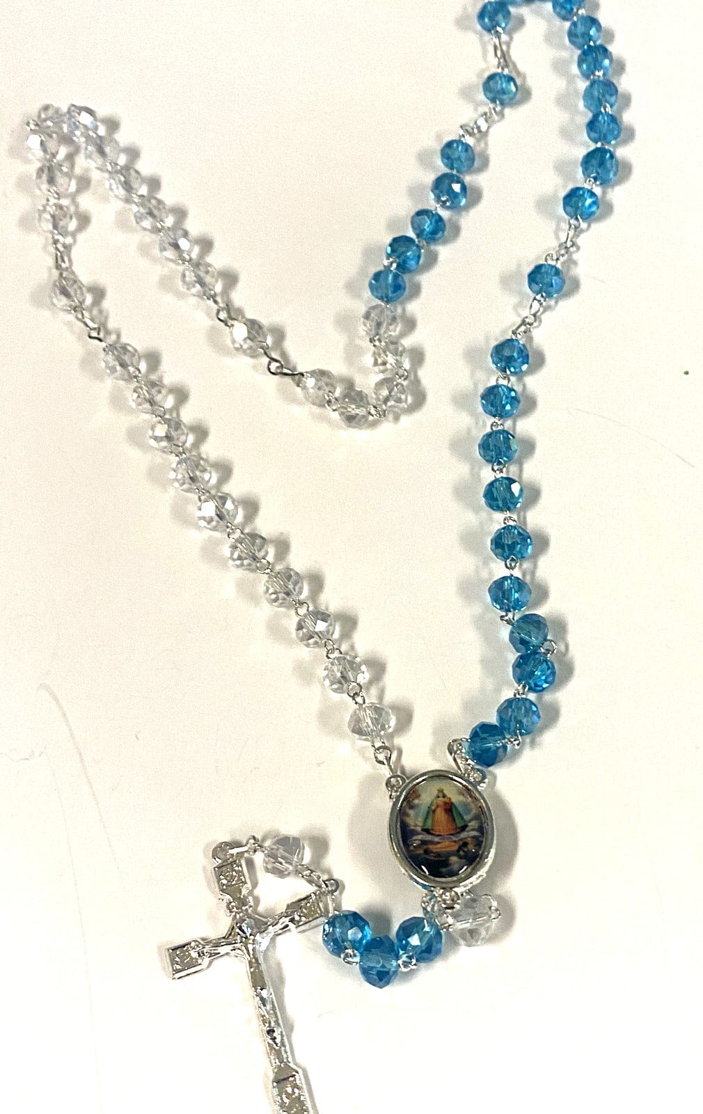 Handmade Our Lady of Charity rosary from Colombia with beads and medal, Christian Catholic jewelry by Bob and Penny Lord.