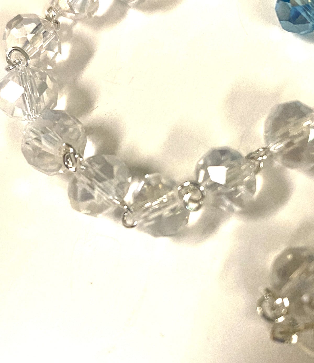 Handmade Our Lady of Charity Caridad del Cobre rosary with beads and crucifix, crafted in Colombia by Bob and Penny Lord.
