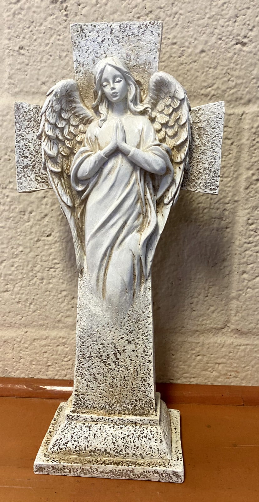 Standing garden angel sculpture, 12 inches tall, decorative figurine with detailed angel wings and serene expression.