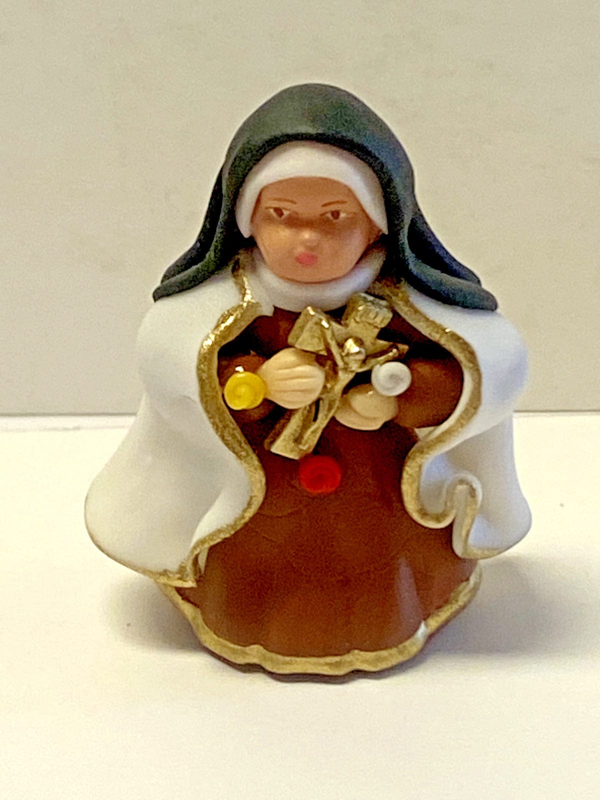 Miniature Saint Therese of Lisieux statue, 1.50 inches, Christian religious collectible from Bob and Penny Lord, new from Colombia.