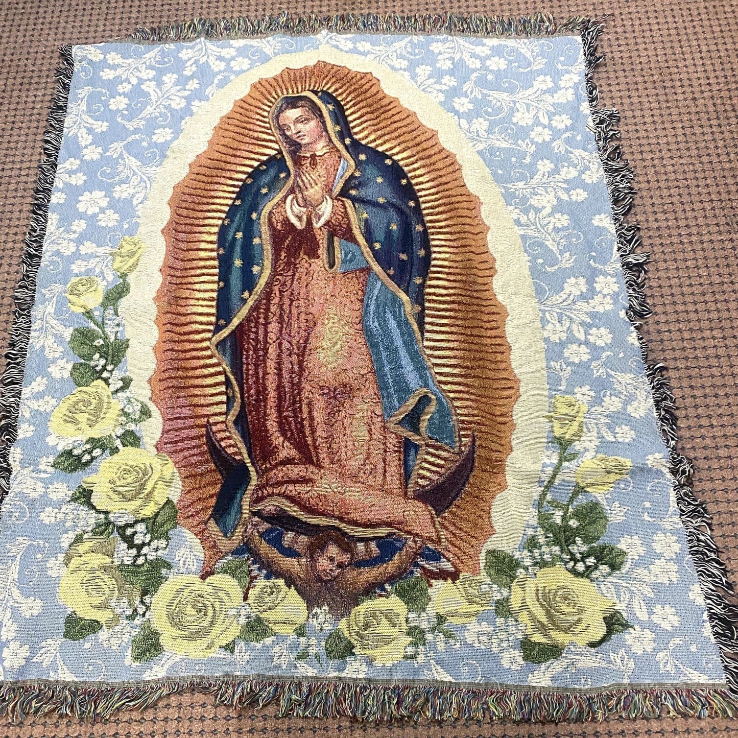 Lady of Guadalupe tapestry throw blanket from Bob and Penny Lord Journeys of Faith, featuring religious Christian imagery.