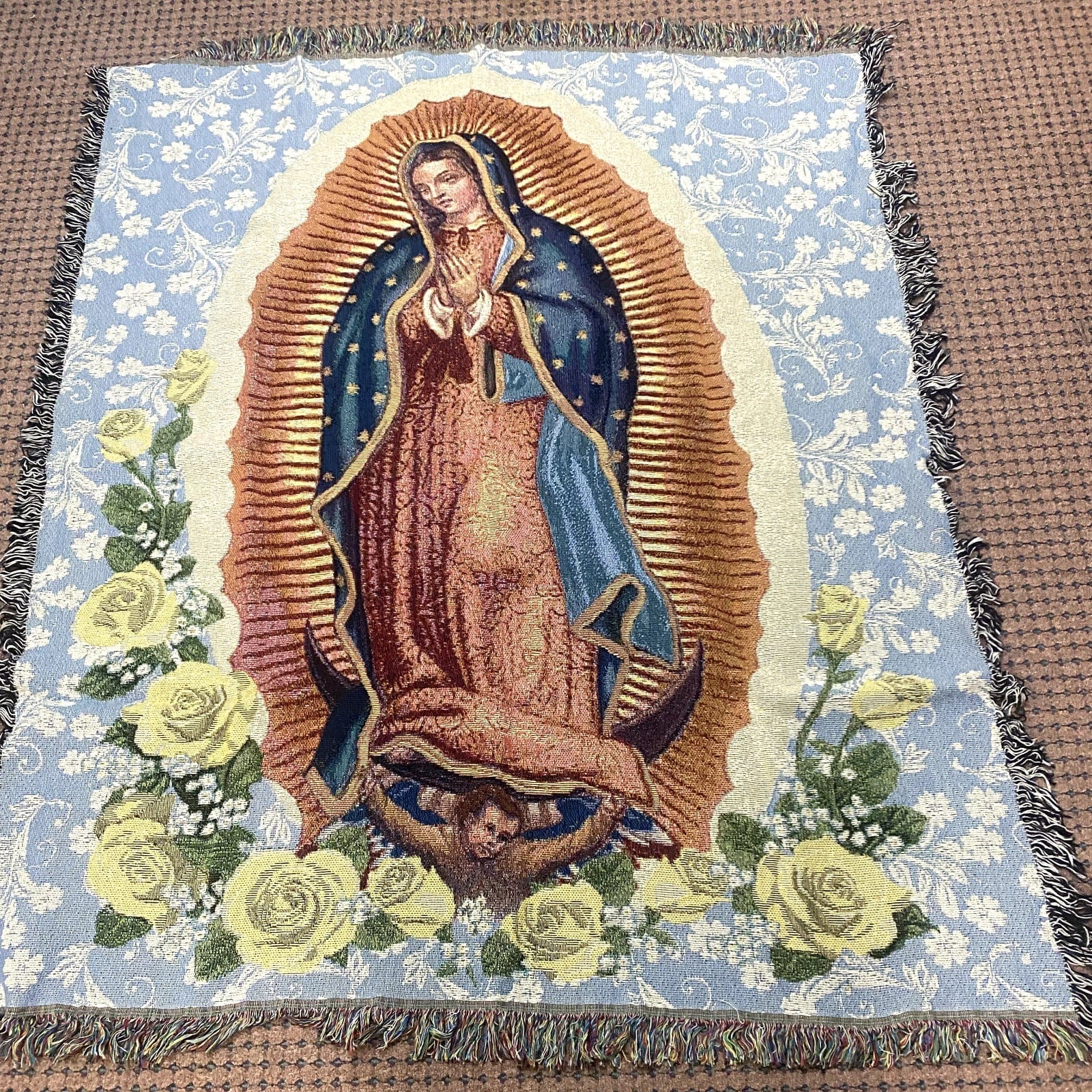 Lady of Guadalupe tapestry throw blanket from Bob and Penny Lord Journeys of Faith, featuring religious Christian imagery.
