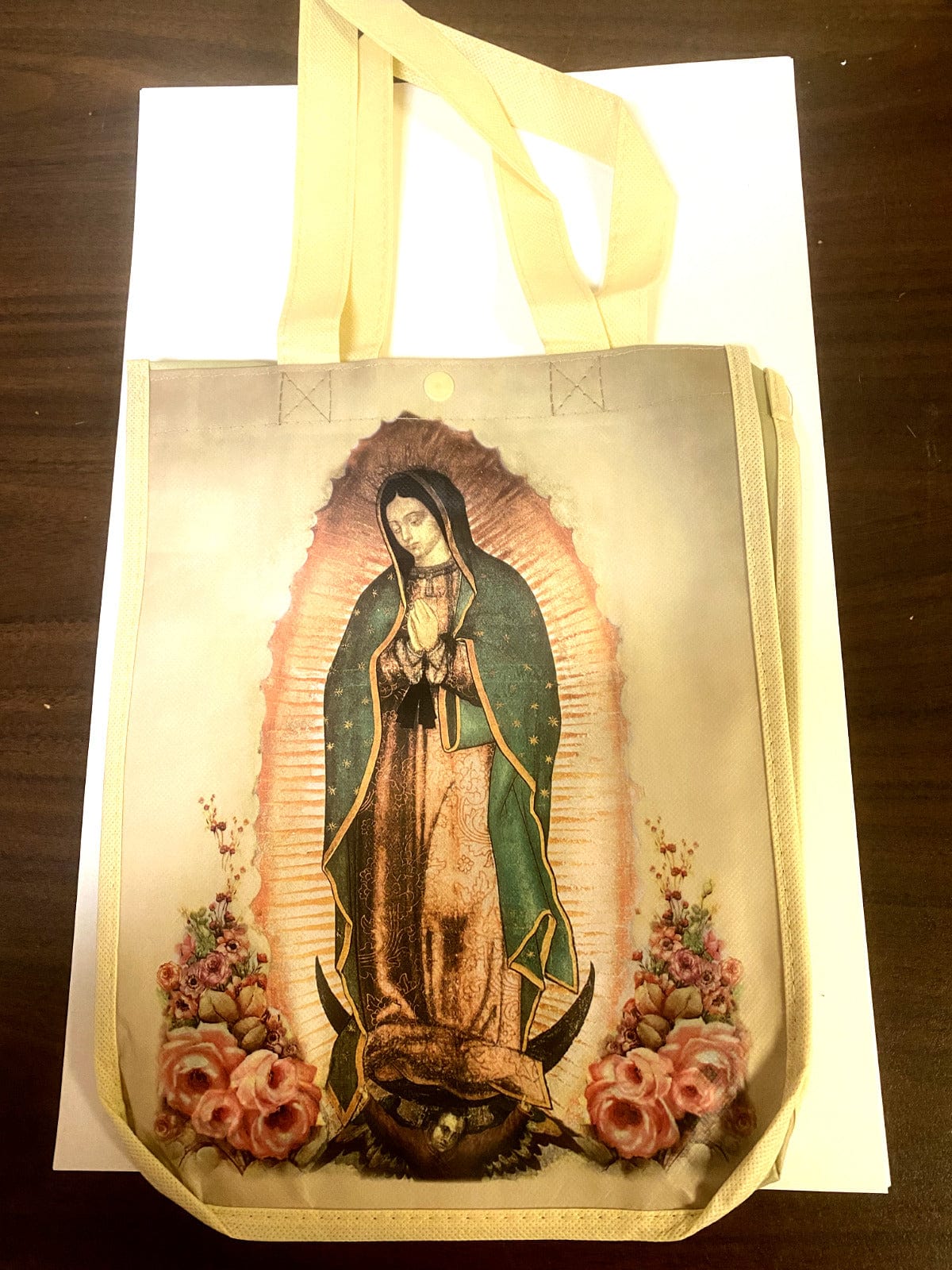 Small tote bag featuring Our Lady of Guadalupe design, Christian collectible by Bob and Penny Lord, with vibrant religious artwork.