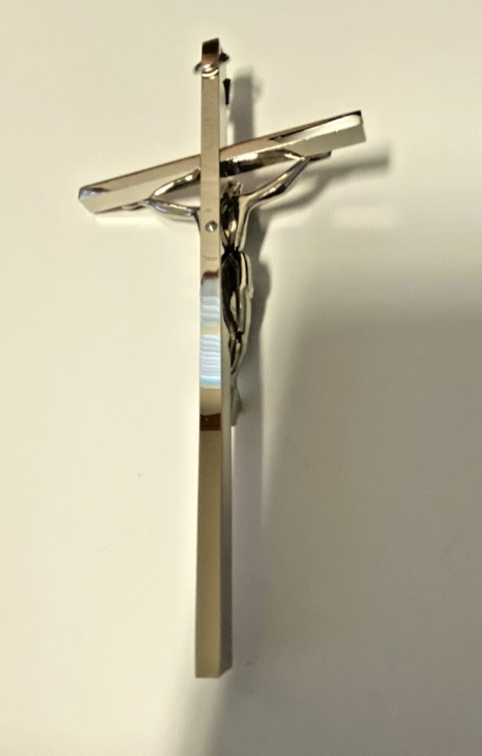 Small 6-inch silver and pink crucifix by Bob and Penny Lord, featuring detailed Christian religious symbolism.