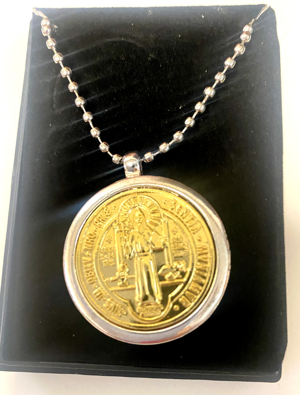 Saint Benedict two-tone medal locket necklace with cross design, 28-inch chain, by Bob and Penny Lord, religious jewelry collectible.