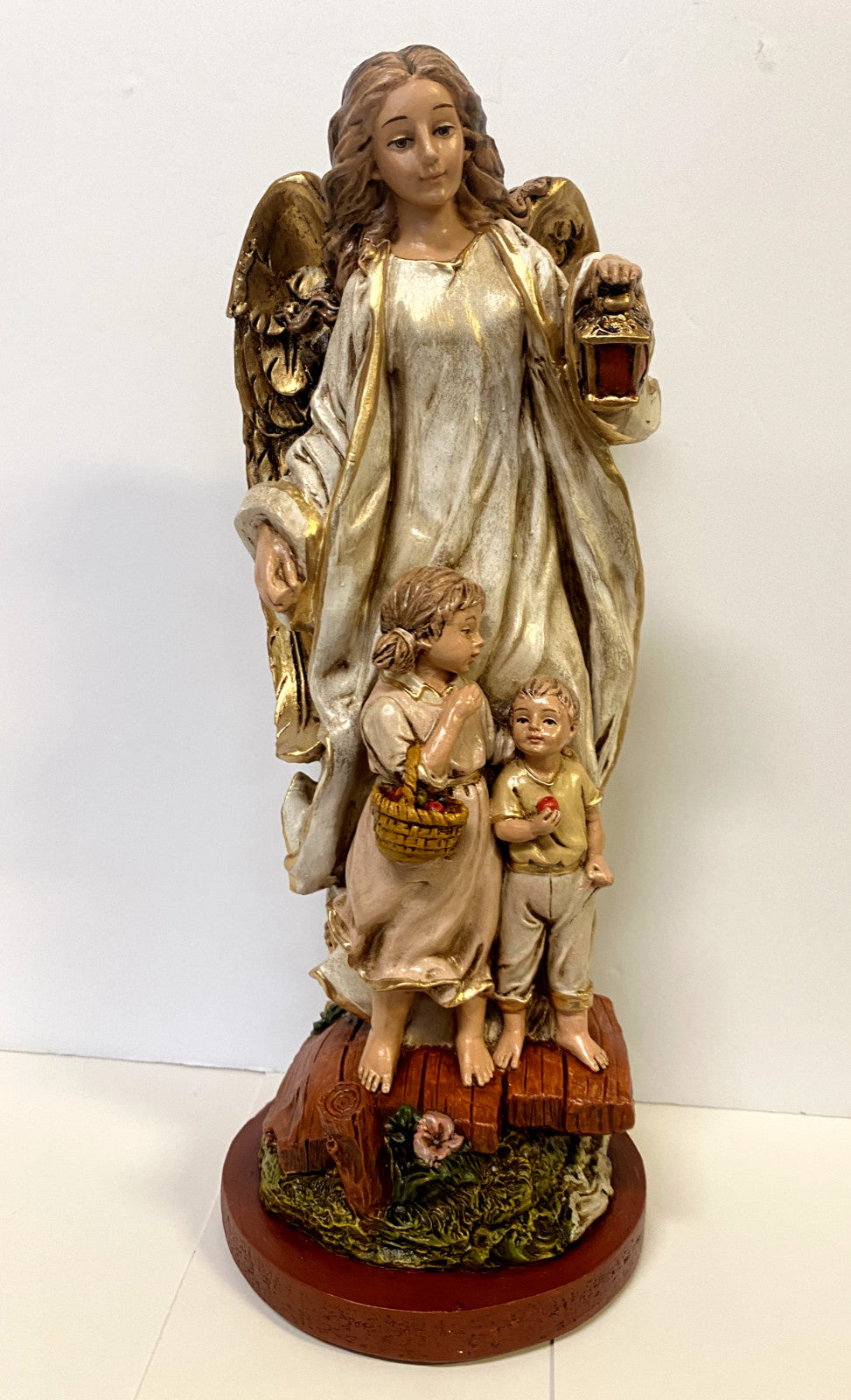 13-inch Guardian Angel statue from Colombia by Journeys of Faith, depicting a serene angel with outstretched wings.