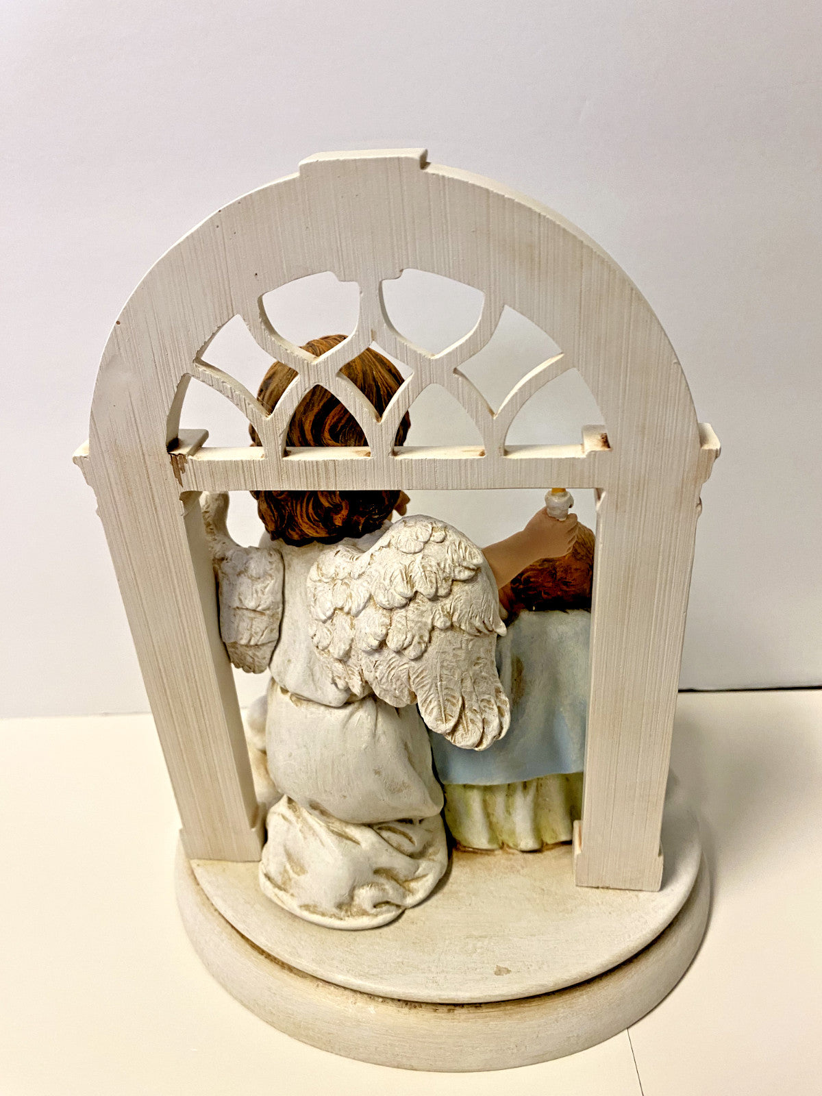 Roman collectible sculpture of a sleeping baby with angel wings, titled "Hush-A-Bye," 8-inch decorative figurine.