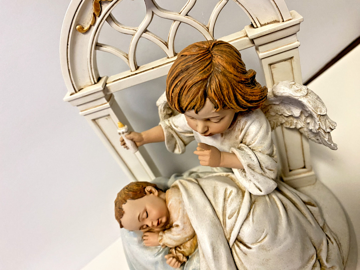 Roman Sleeping Baby with Angel figurine, 8-inch decorative sculpture, showcasing a peaceful baby with angel wings and serene expression.