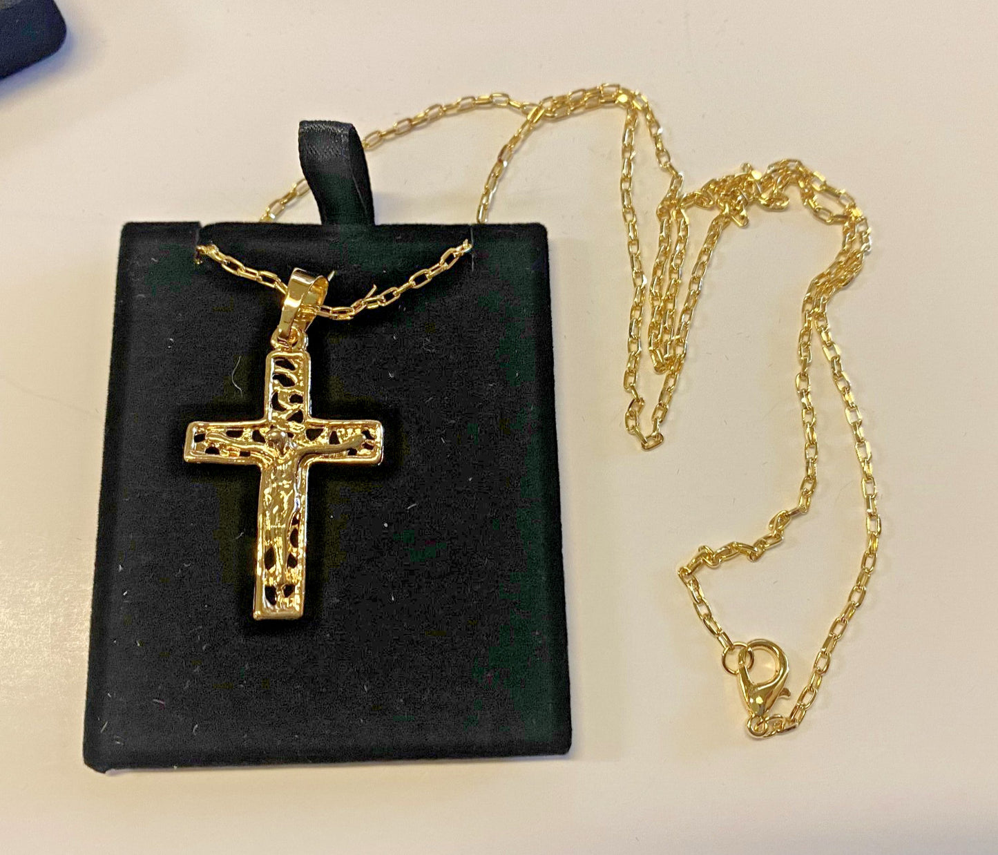 Brazilian gold-plated filigree crucifix necklace, 20-inch fashion jewelry pendant with intricate design and religious symbol.