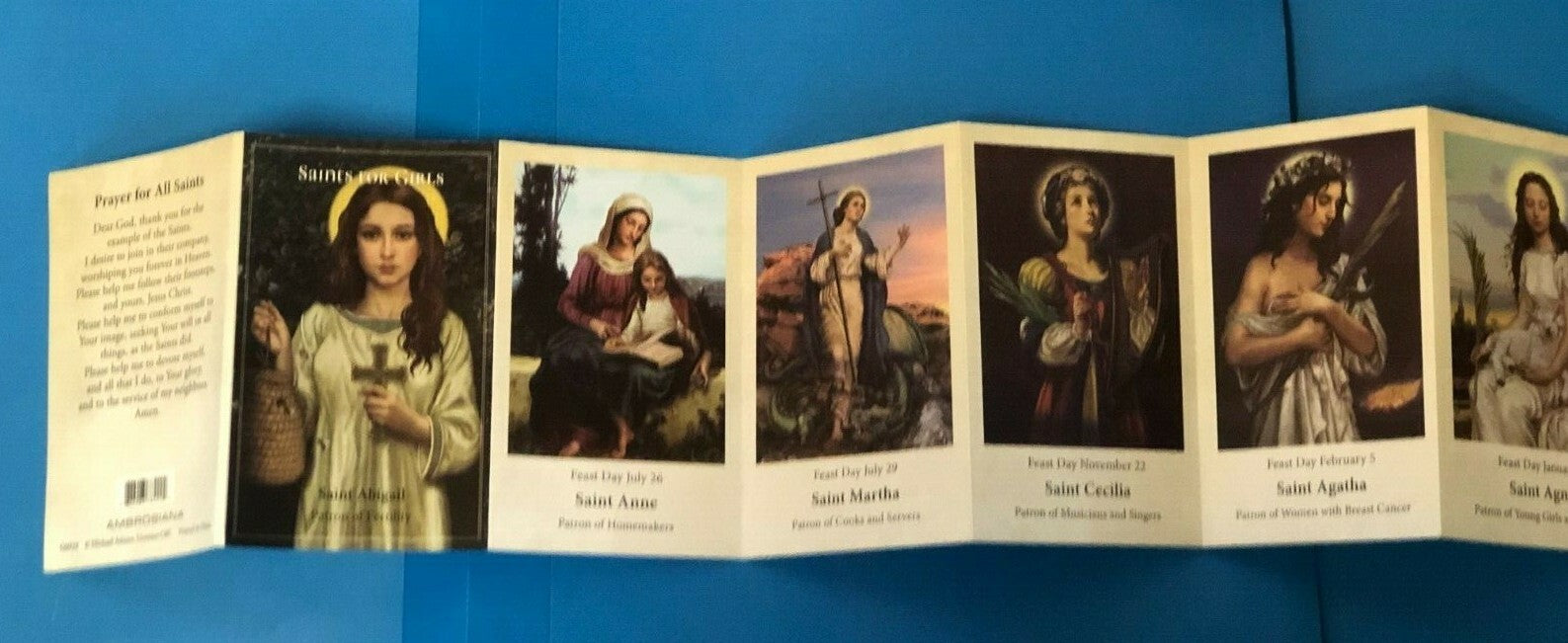 Saints for Girls prayer pocket folder by Bob and Penny Lord, featuring religious holy cards for children’s spirituality.