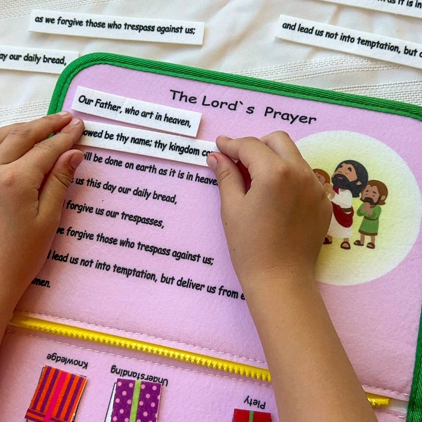 Brother Francis My Pray and Play Busy Book, a quiet felt toy with colorful religious scenes and activities for children.