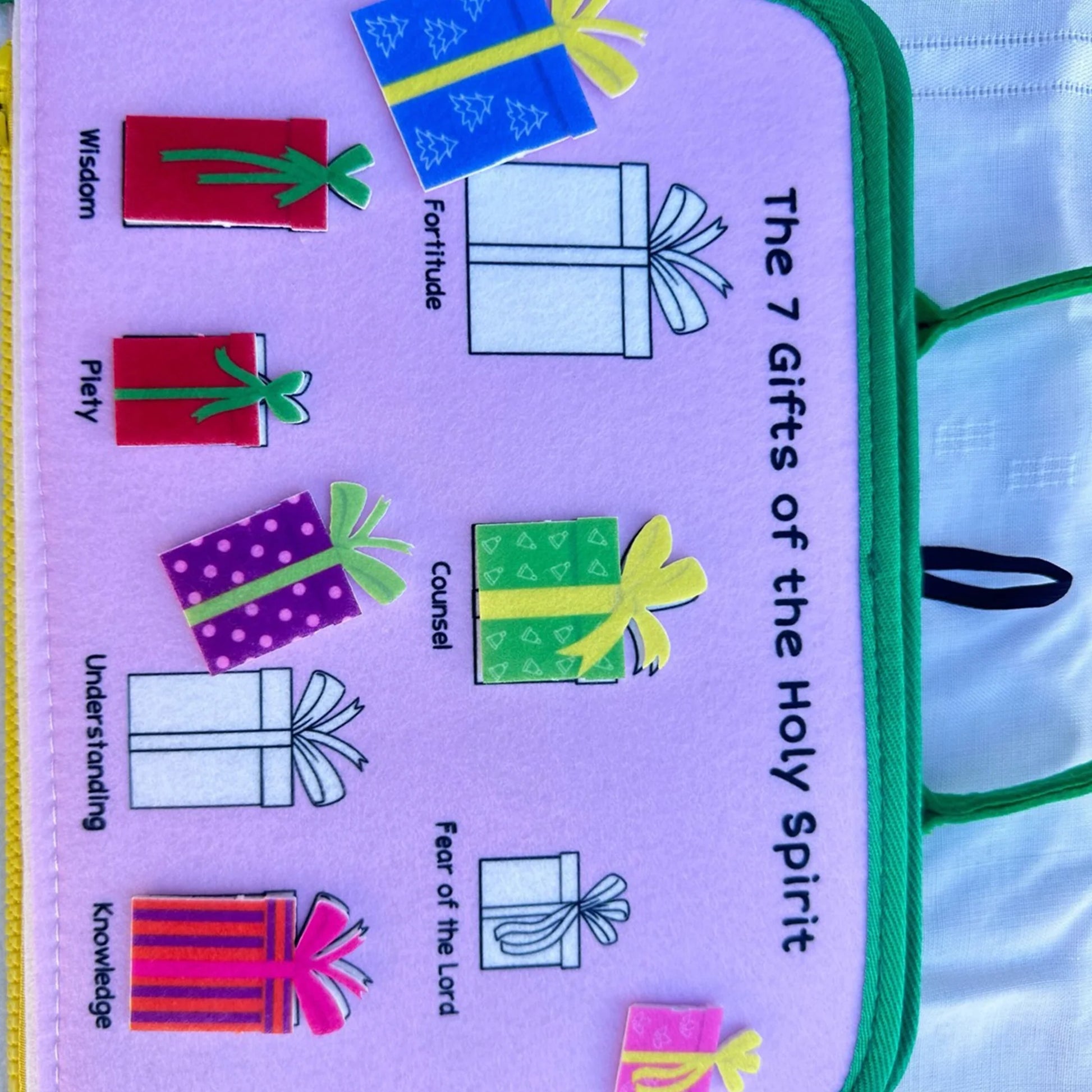 Brother Francis My Pray and Play Busy Book, a colorful felt quiet book with religious activities for children.