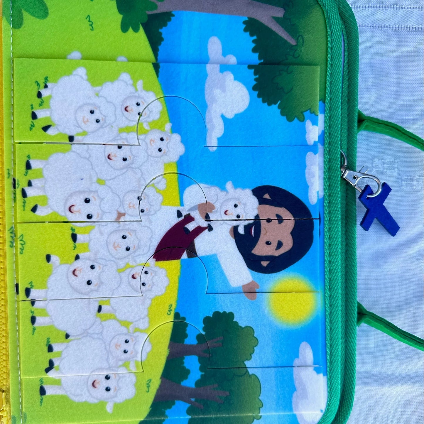 Brother Francis My Pray and Play Busy Book, a colorful felt quiet book with religious activities for children.