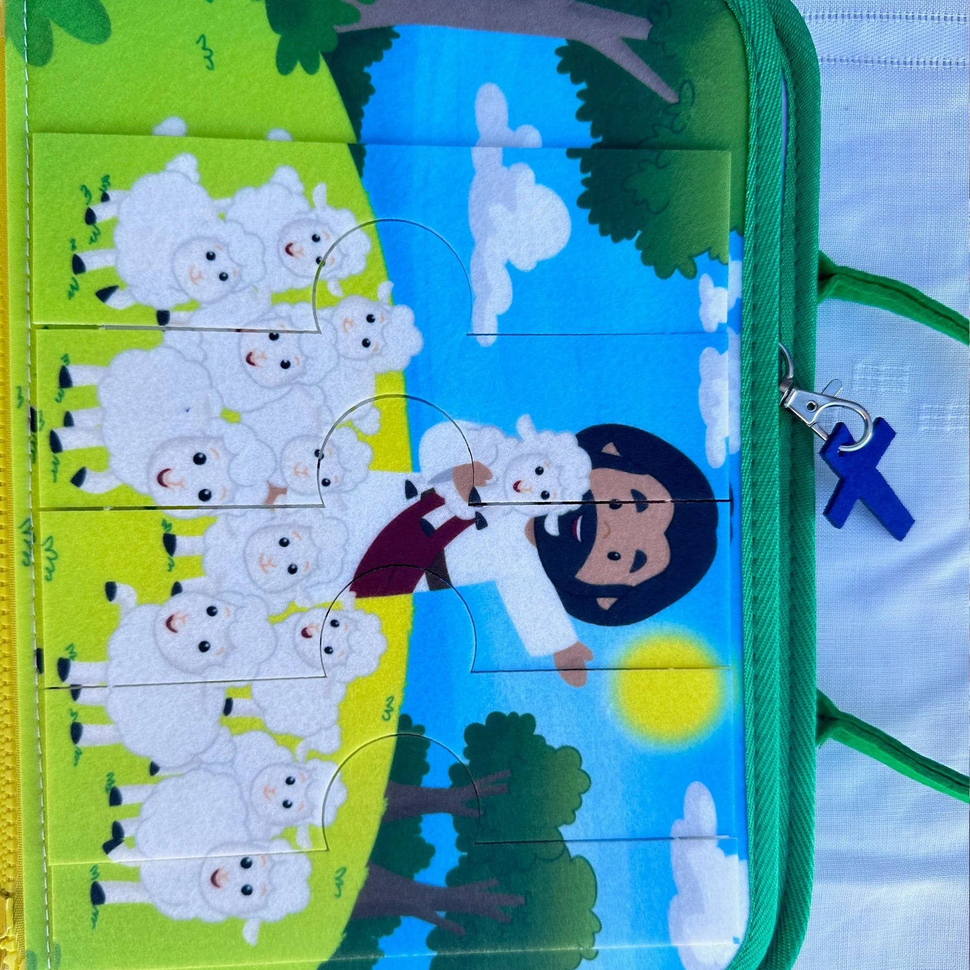 Brother Francis My Pray and Play Busy Book, a colorful felt quiet book with religious activities for children.
