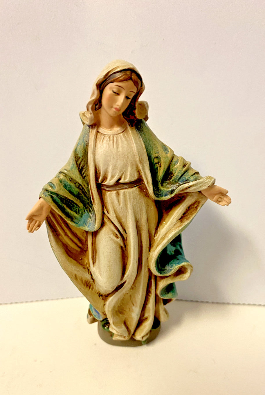 Small 4-inch Our Lady of Grace statue by Bob and Penny Lord, depicting the Virgin Mary in a serene religious pose.