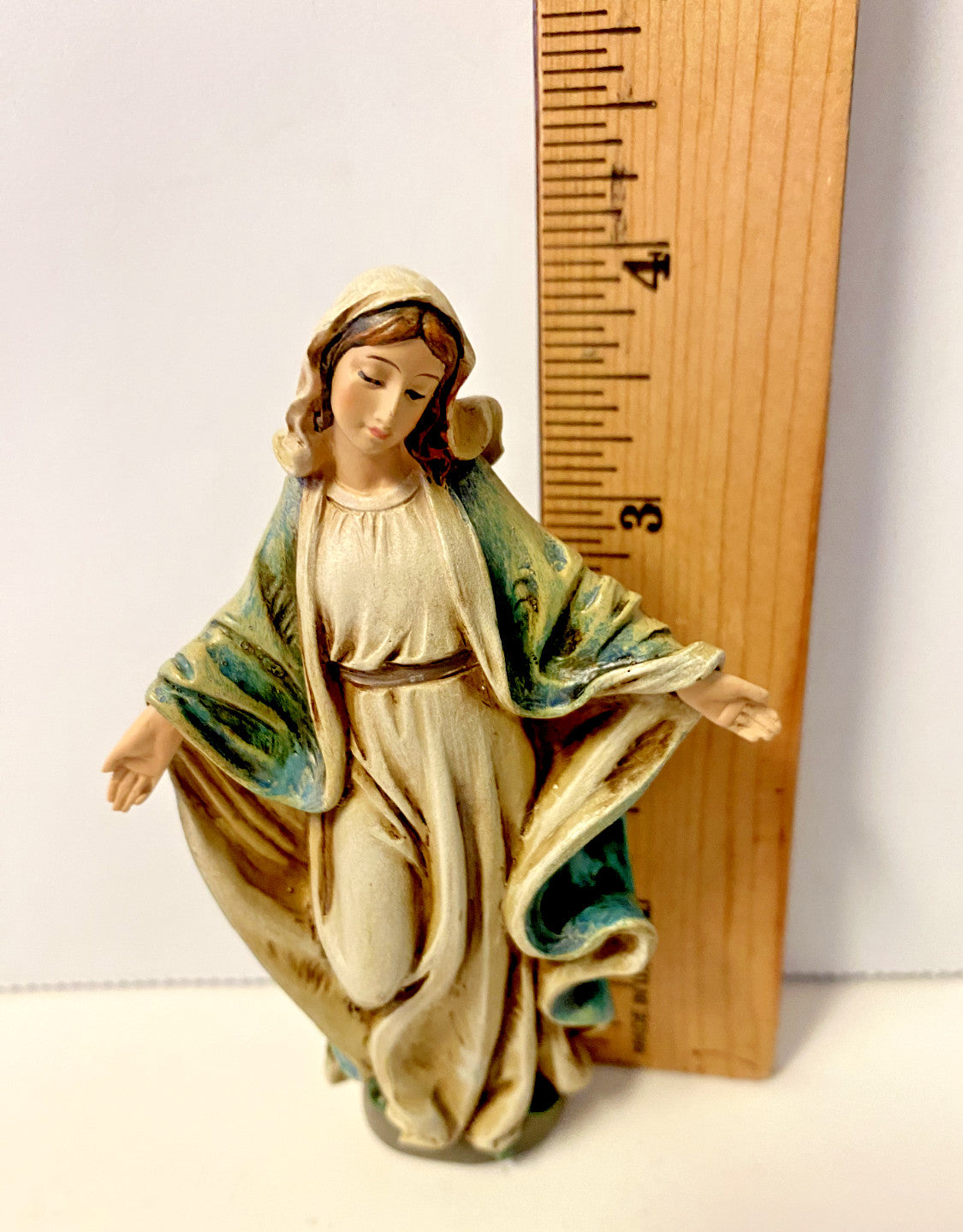 Small 4-inch Our Lady of Grace Christian statue by Bob and Penny Lord, featuring a detailed religious figure.
