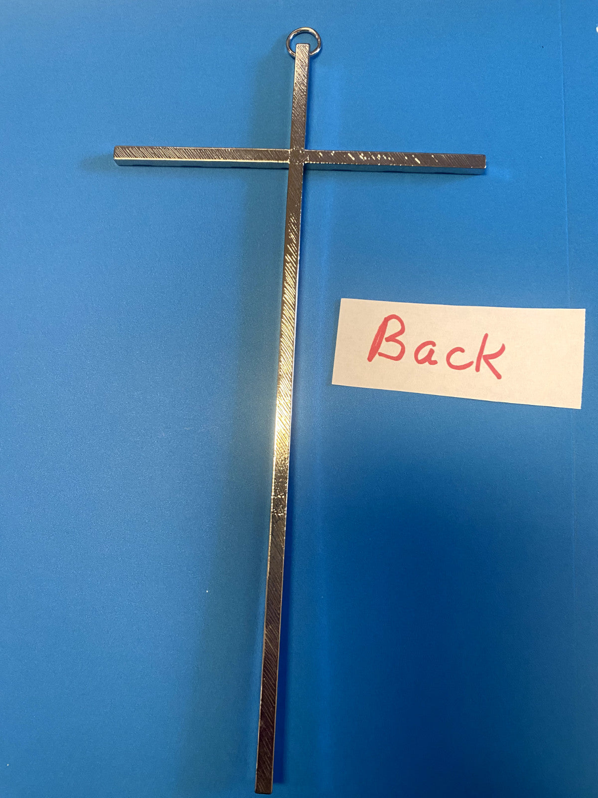 Silver tone hammered wall cross, Christian religious decor by Bob and Penny Lord, suitable for spiritual or collectible display.