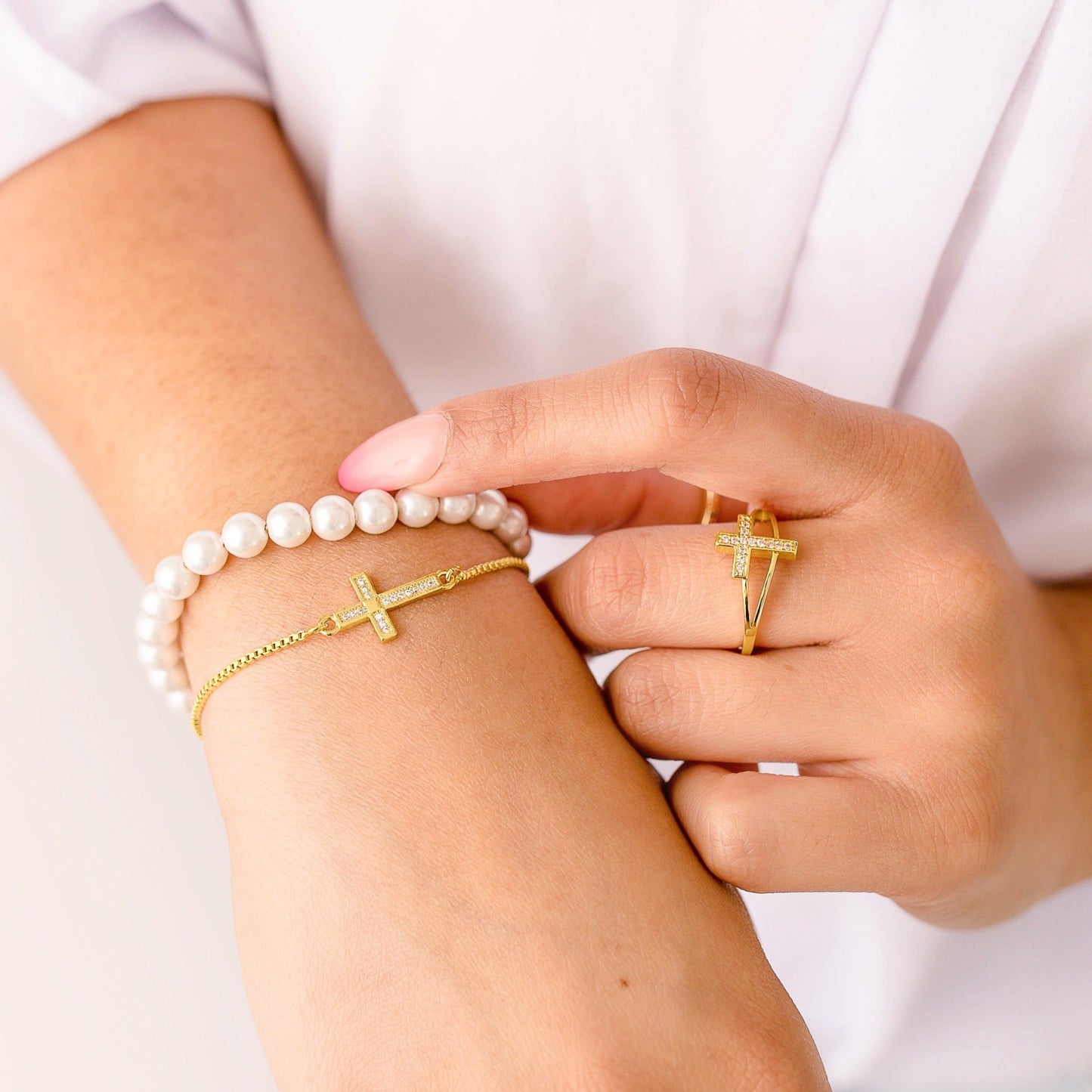 Adjustable gold and silver bracelet from AMADI Jewelry featuring a sleek, minimalist design for versatile styling.