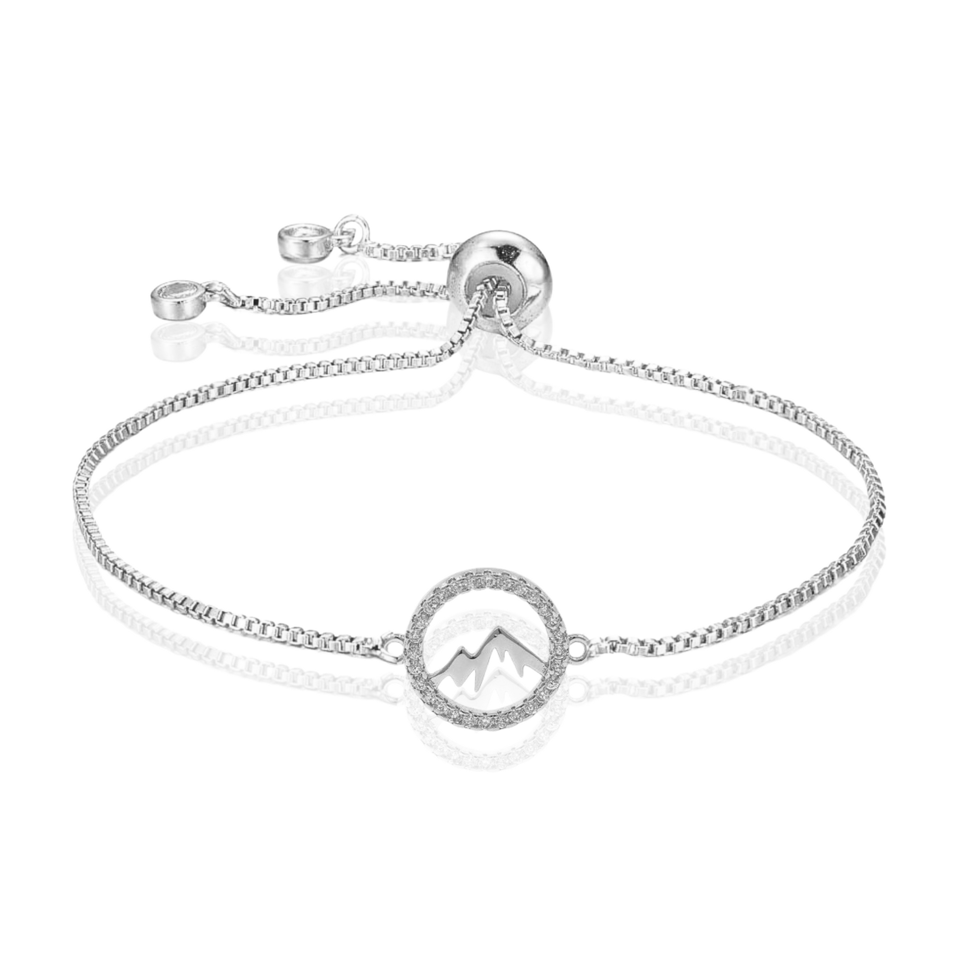 Adjustable Faith Moves Mountains bracelet by AMADI Jewelry in gold and silver with mountain and faith charm accents.
