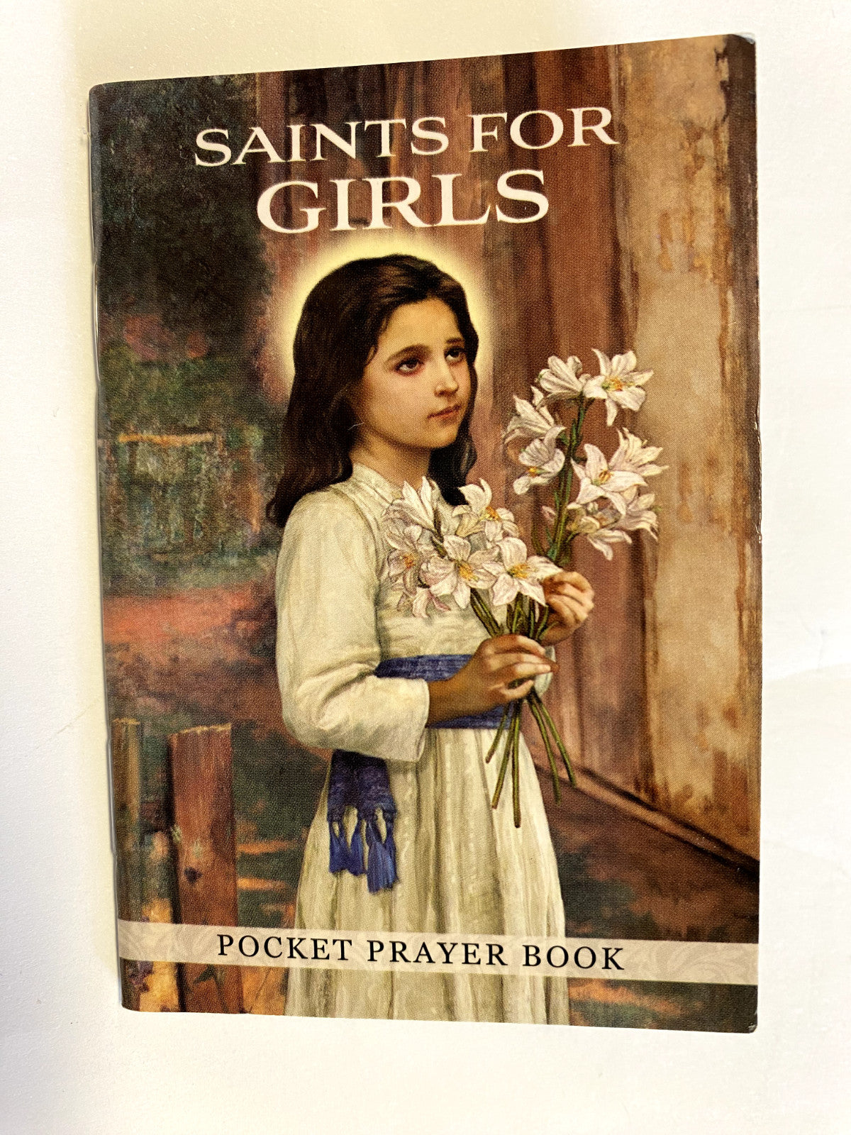 Image of a Saints for Girls Pocket Prayer Book by Bob and Penny Lord, featuring religious holy cards for children.