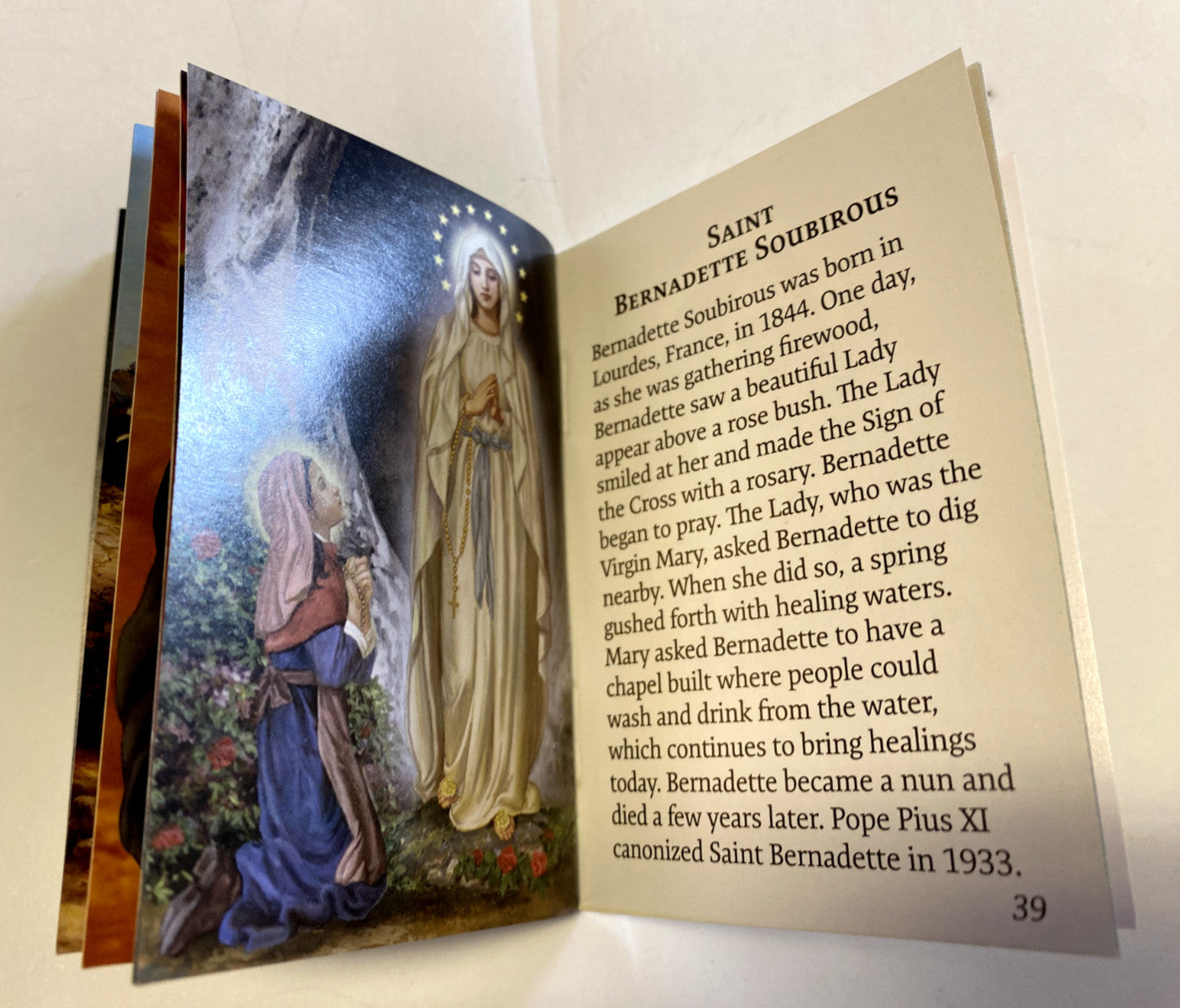 Pocket prayer book for girls featuring saints, with Christian holy card design by Bob and Penny Lord.
