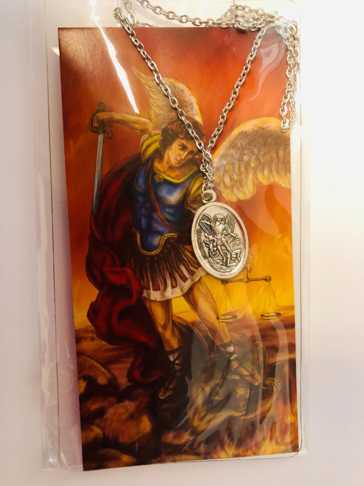 Two-sided Saint Michael the Archangel guardian angel medal necklace, unbranded fashion jewelry with detailed religious pendant.