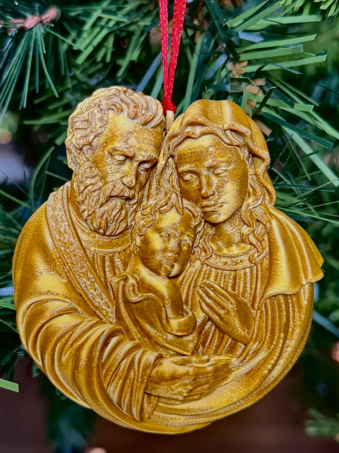 Holy Family Christmas ornament by St. Augustine Prints featuring a detailed depiction of the Holy Family for holiday decor