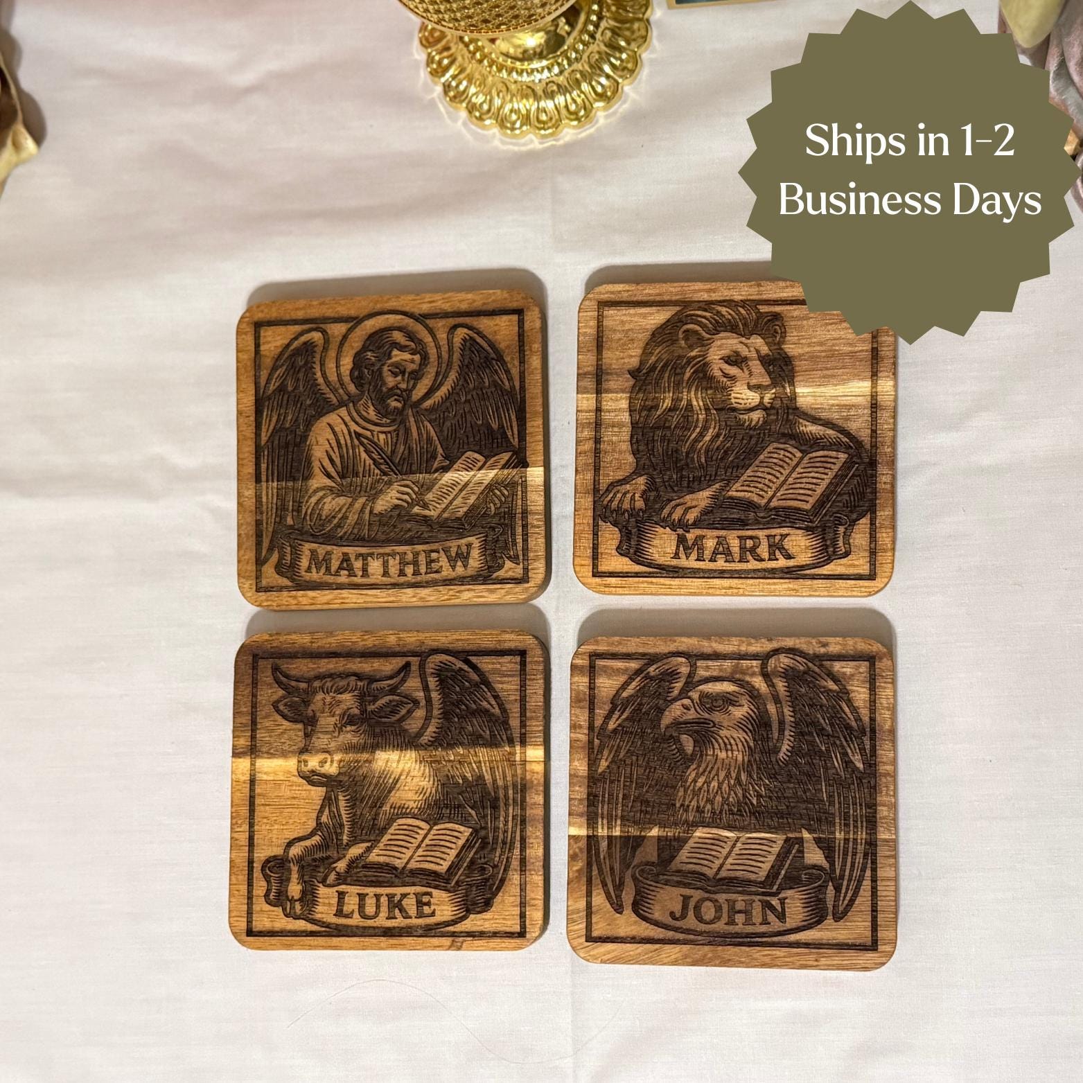 Wooden evangelist coaster set with religious Christian designs from St. Augustine Prints, featuring four handcrafted wooden drink coasters.