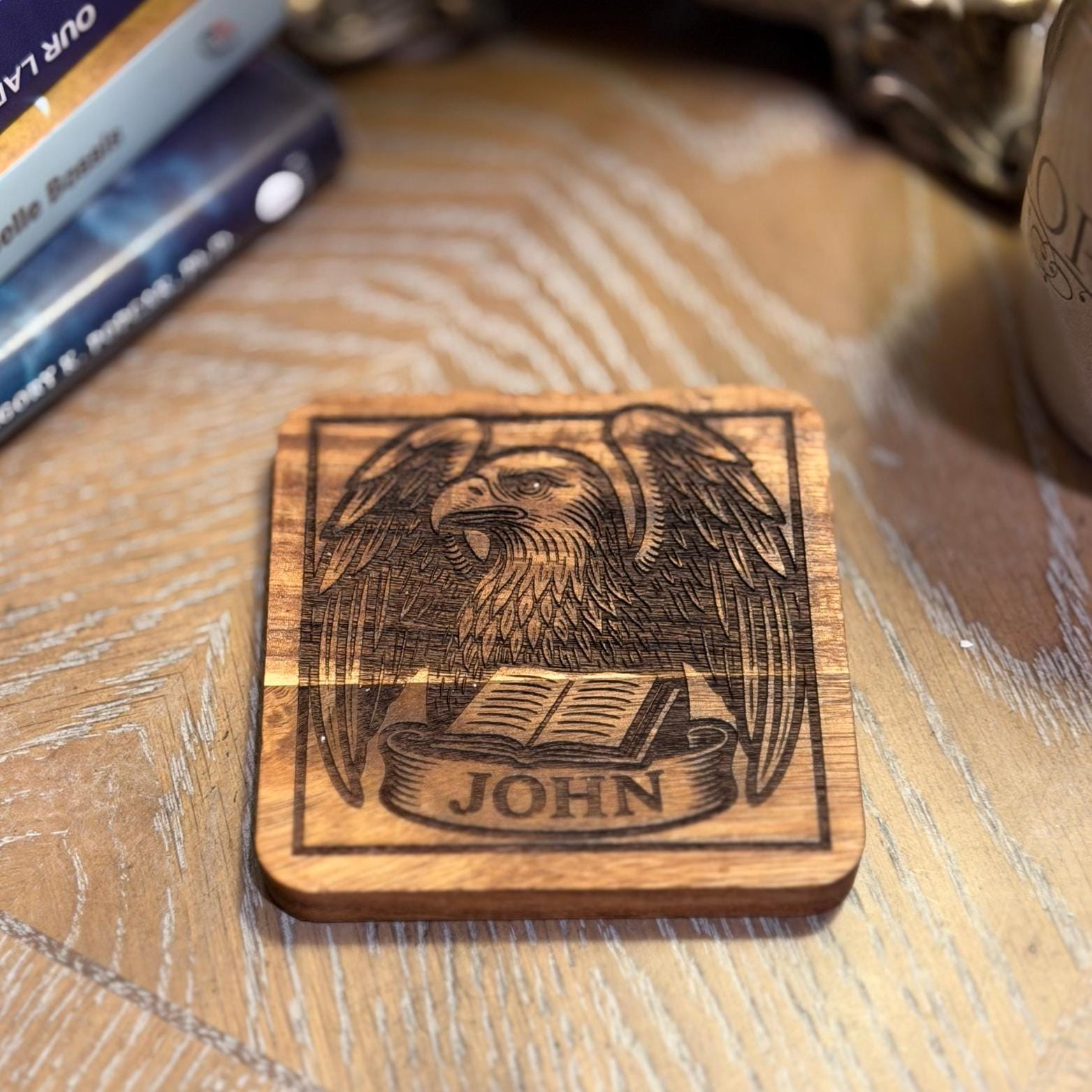 Set of four wooden evangelist coasters with religious Christian symbols by St. Augustine Prints, perfect for tabletop decor.