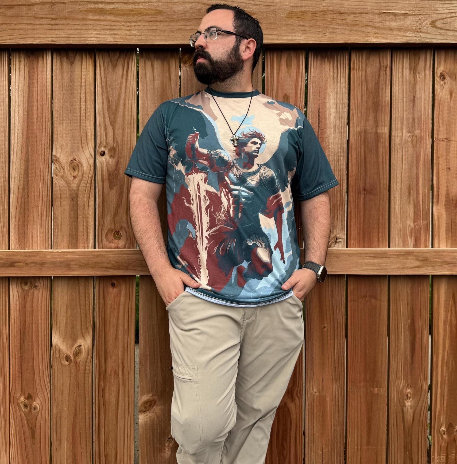 Saint Michael T-shirt by St. Augustine Prints featuring a detailed graphic of Saint Michael the Archangel on front.