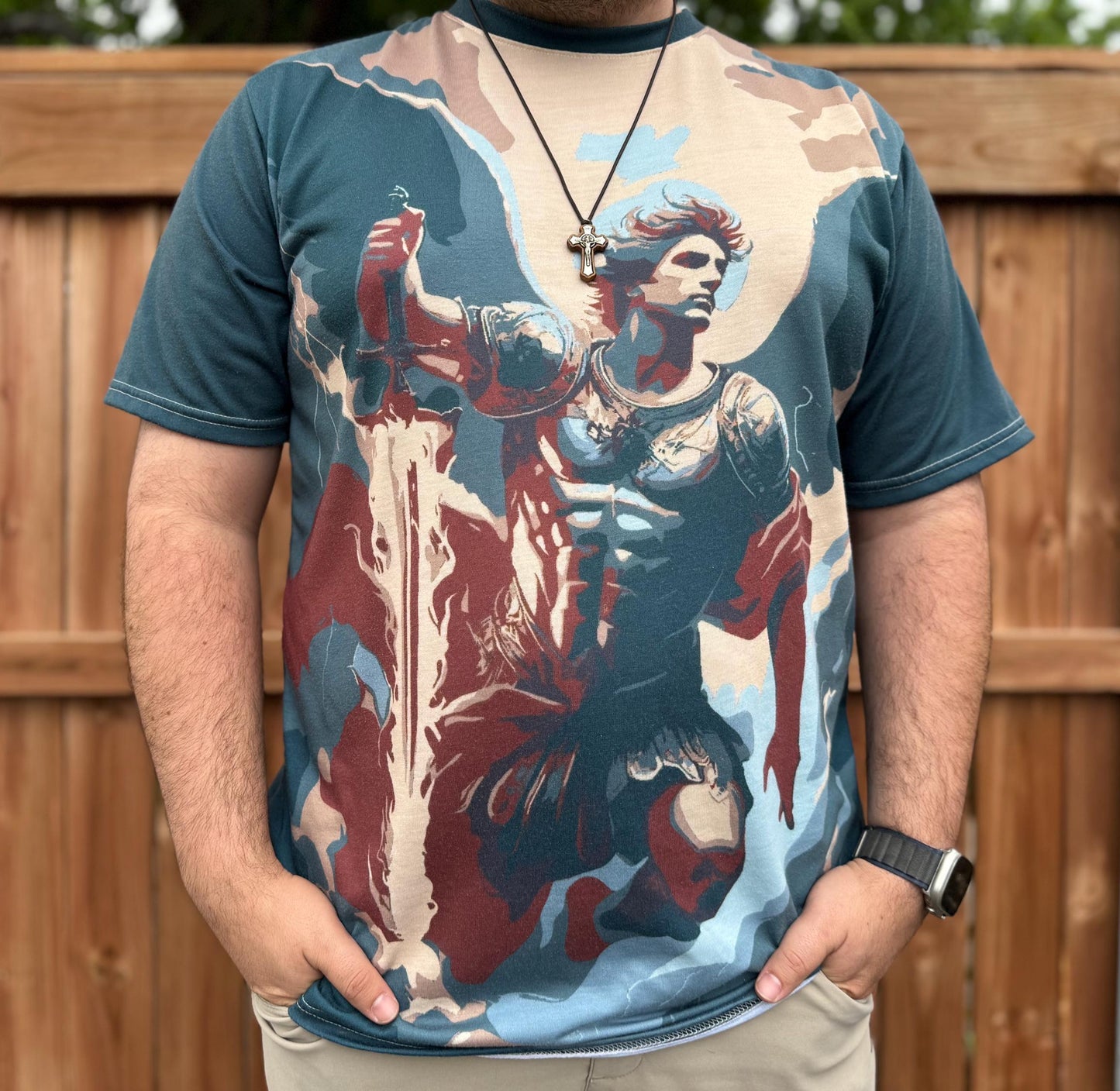 Saint Michael T-shirt by St. Augustine Prints featuring a detailed religious artwork of Saint Michael on the front.