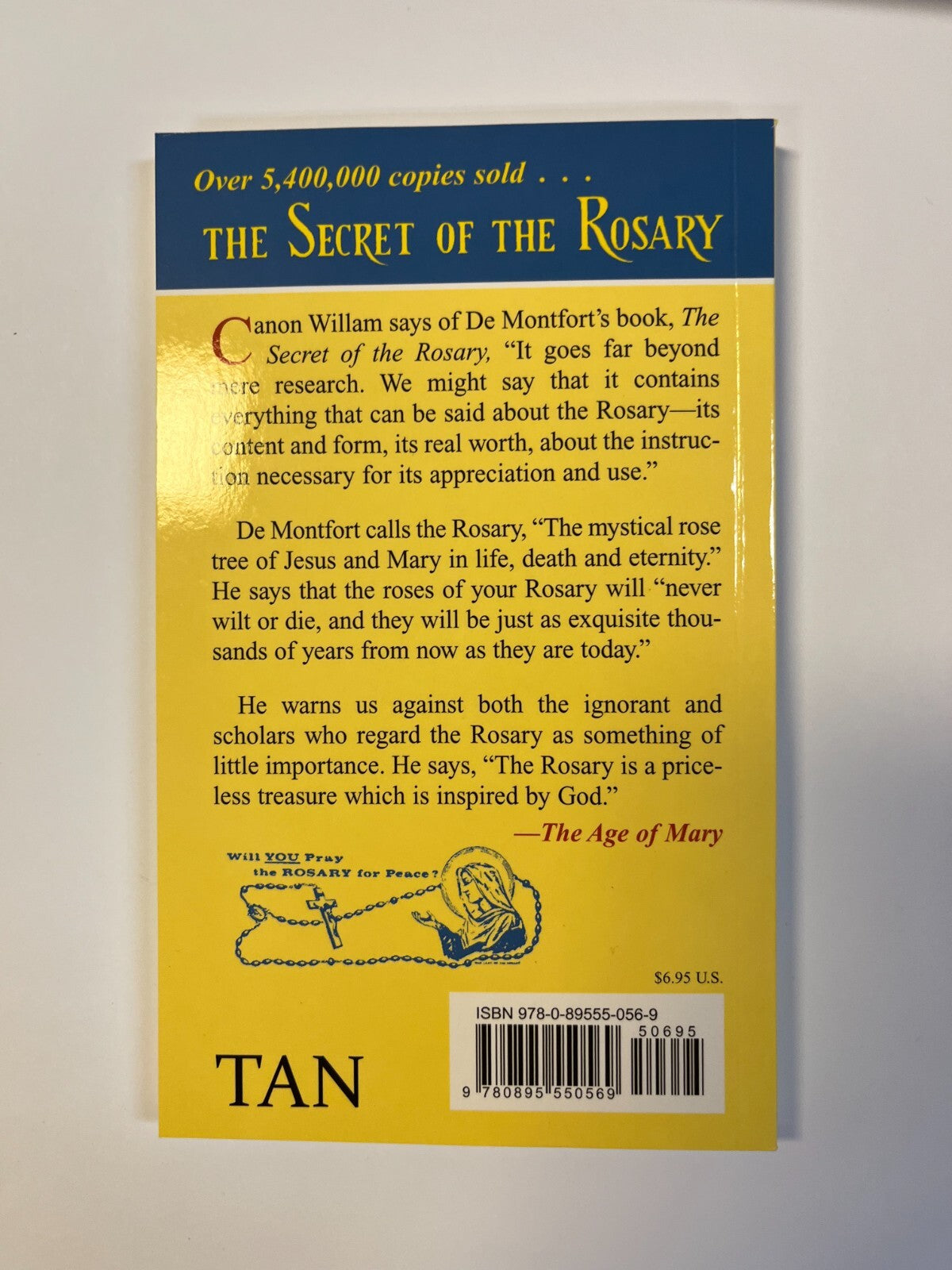 Paperback book titled "The Secret of the Rosary" by Bob and Penny Lord, featuring a cover image with religious artwork.