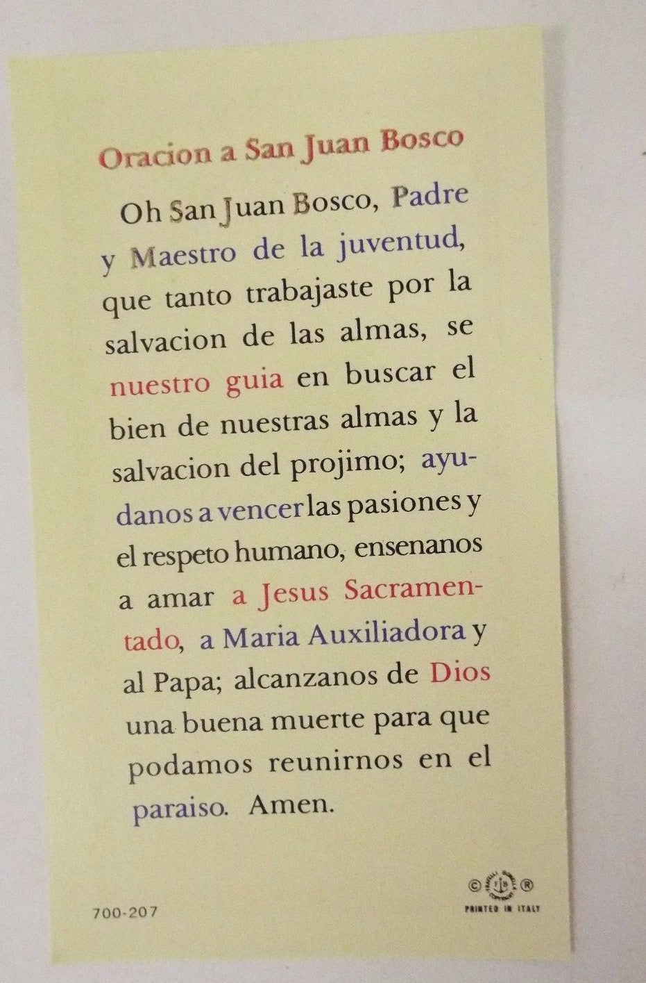 Spanish prayer card featuring Saint John Bosco, Christian Holy Card collectible by Bob and Penny Lord, with religious imagery and prayer text.